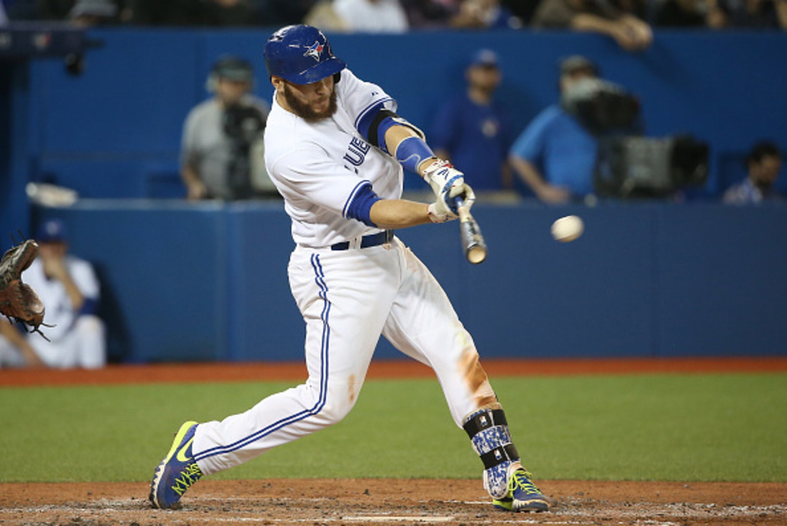 TORONTO, CANADA - MAY 19: Russell Martin #55 of the Toronto Blue Jays hits a single in the sixth inning during MLB game action against the Los Angeles Angels of Anaheim on May 19, 2015 at Rogers Centre in Toronto, Ontario, Canada. (Photo by Tom Szczerbows TORONTO, CANADA - MAY 19: Russell Martin #55 of the Toronto Blue Jays hits a single in the sixth inning during MLB game action against the Los Angeles Angels of Anaheim on May 19, 2015 at Rogers Centre in Toronto, Ontario, Canada. (Photo by Tom Szczerbows
