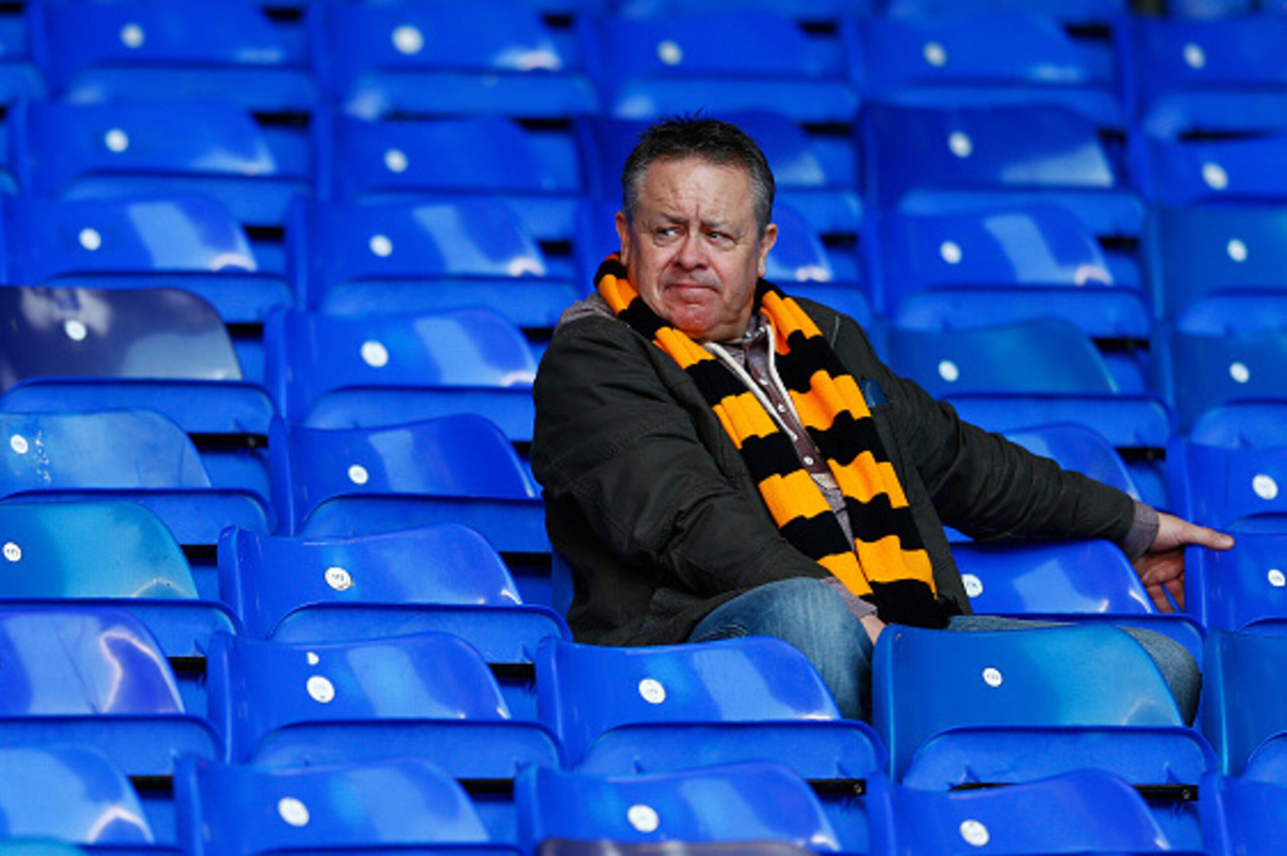LONDON, ENGLAND - MAY 16:  A Hull City fan looks on from the stands during the Barclays Premier League match between  Tottenham Hotspur and Hull City at White Hart Lane on May 16, 2015 in London, England.  (Photo by Julian Finney/Getty Images)