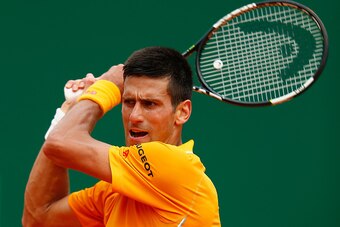 MONTE-CARLO, MONACO - APRIL 18:  Novak Djokovic of Serbia plays a backhand to Rafael Nadal of Spain in the semi finals during day seven of the Monte Carlo Rolex Masters tennis at the Monte-Carlo Sporting Club on April 18, 2015 in Monte-Carlo, Monaco.  (Ph