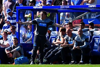 LONDON, ENGLAND - MAY 16: John Carver, manager of Newcastle United gestures during the Barclays Premier League match between Queens Park Rangers and Newcastle United at Loftus Road on May 16, 2015 in London, England.  (Photo by Shaun Botterill/Getty Image
