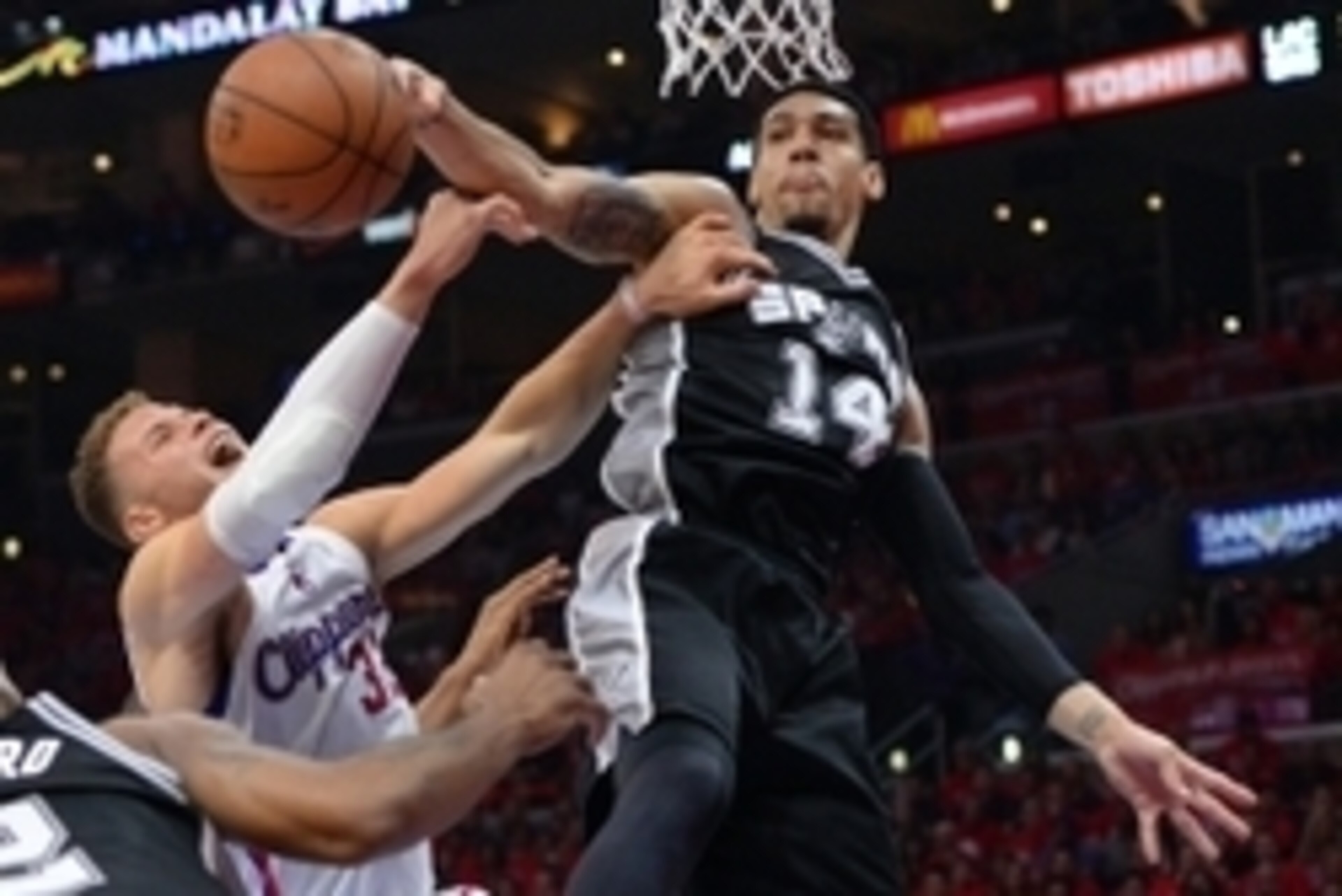 May 2, 2015; Los Angeles, CA, USA; San Antonio Spurs guard Danny Green (14) blocks a shot by Los Angeles Clippers forward Blake Griffin (32) in the first half of game seven of the first round of the NBA Playoffs at Staples Center. Mandatory Credit: Jayne 