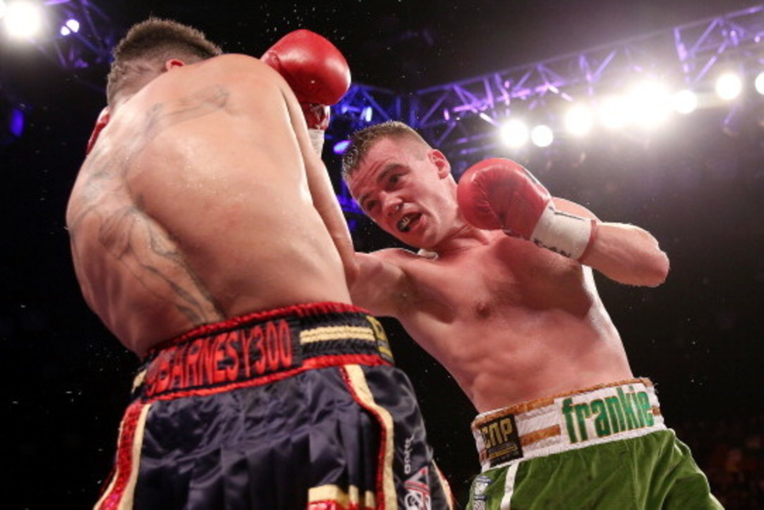 LONDON, ENGLAND - SEPTEMBER 21:  Frankie Gavin catches David Barnes with a right hook during their British and Commonwealth welterweight championship bout at The Copper Box on September 21, 2013 in London, England.  (Photo by Scott Heavey/Getty Images)