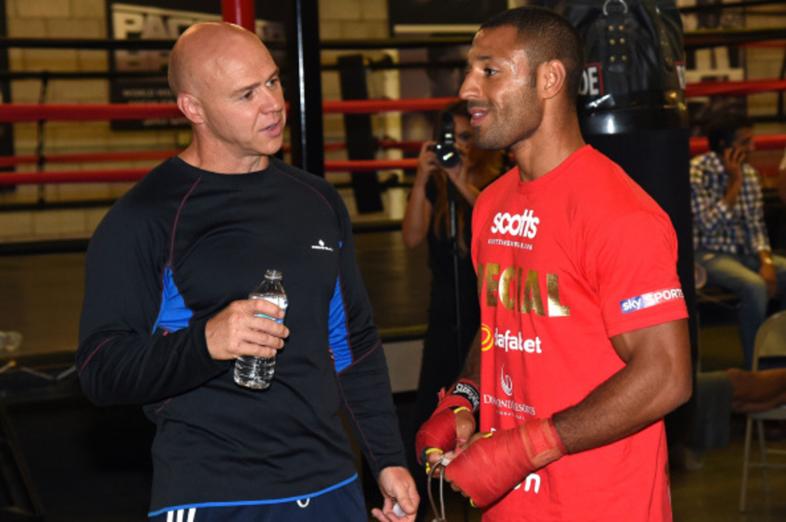 LAS VEGAS, NV - AUGUST 06:  Trainer Dominic Ingle (L) talks with boxer Kell Brook during a media workout at Barry's Gym on August 6, 2014 in Las Vegas, Nevada. Brook will challenge Shawn Porter for his IBF welterweight championship in Carson, California o