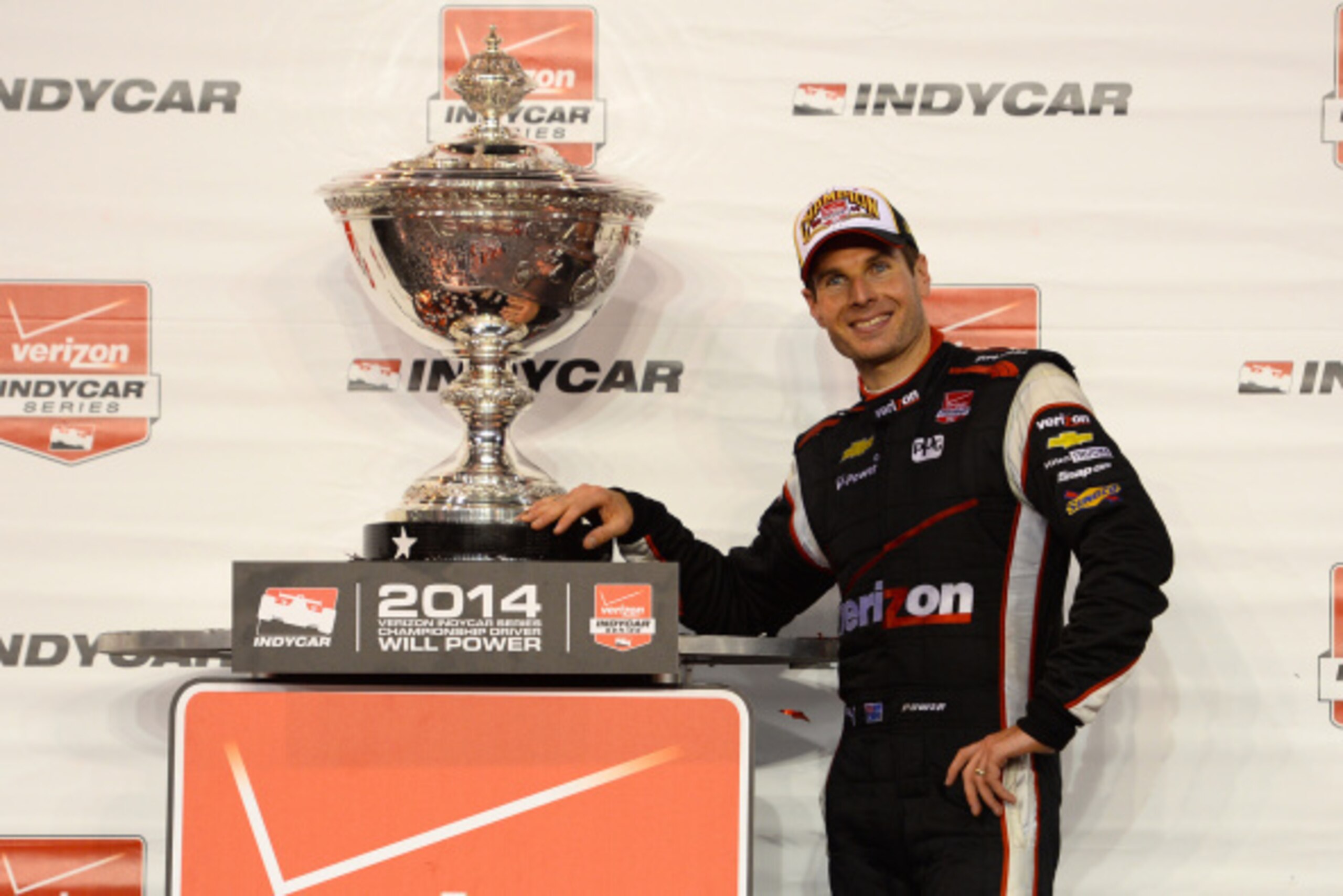 FONTANA, CA - AUGUST 30:  Will Power of Australia driver of the #12 Team Penske Dallara Chevrolet celebrates after winning the IndyCar Championship during the Verizon IndyCar Series MAVTV 500 IndyCar World Championship Race at the Auto Club Speedway on Au