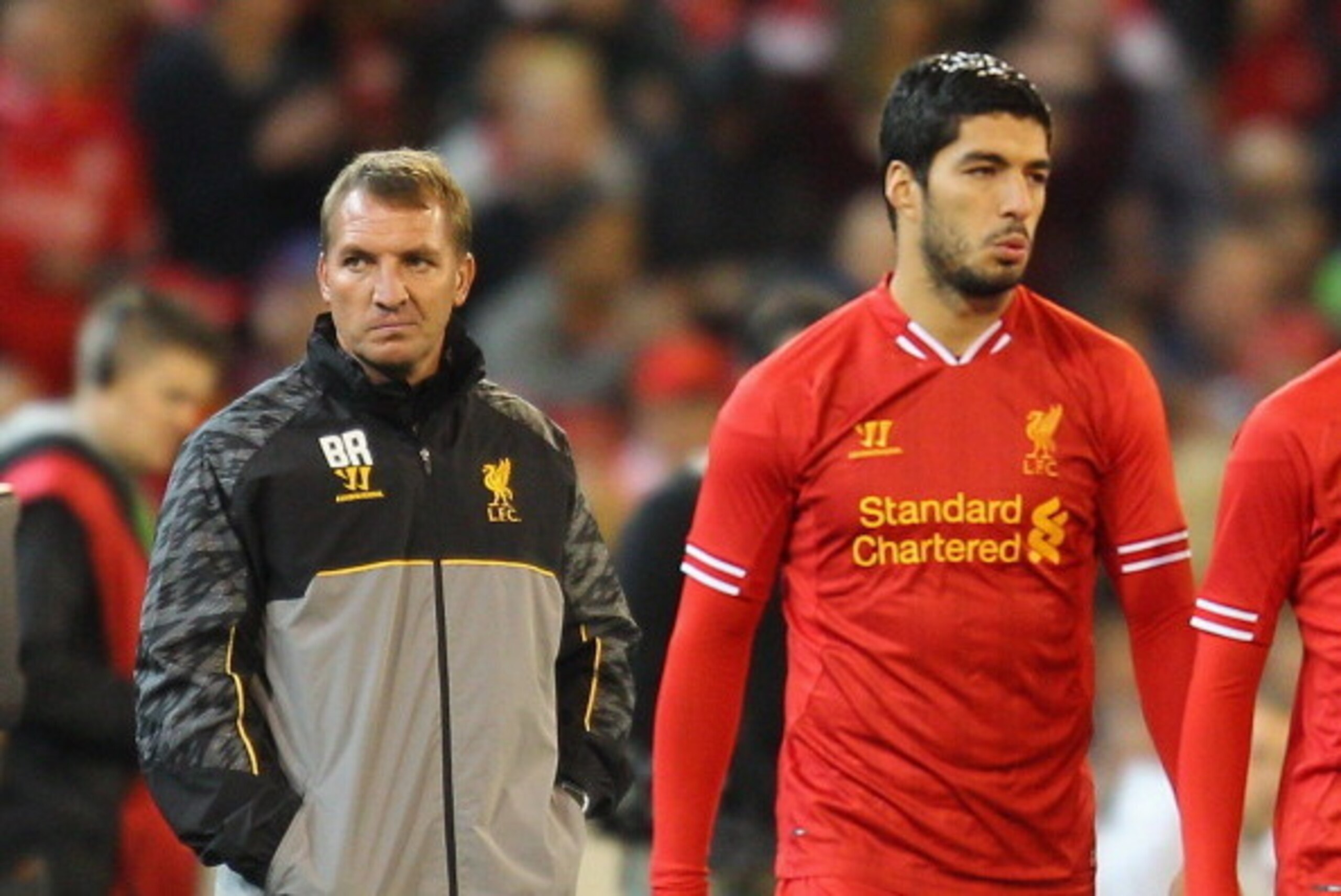 MELBOURNE, AUSTRALIA - JULY 24:  Liverpool FC Manager Brendan Rodgers (L) looks on as Luis Suarez of Liverpool is substituted into the match during the match between the Melbourne Victory and Liverpool at the Melbourne Cricket Ground on July 24, 2013 in M