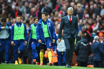 MANCHESTER, ENGLAND - MAY 17:  Arsene Wenger manager of Arsenal looks on at half time during the Barclays Premier League match between Manchester United and Arsenal at Old Trafford on May 17, 2015 in Manchester, England.  (Photo by Shaun Botterill/Getty I