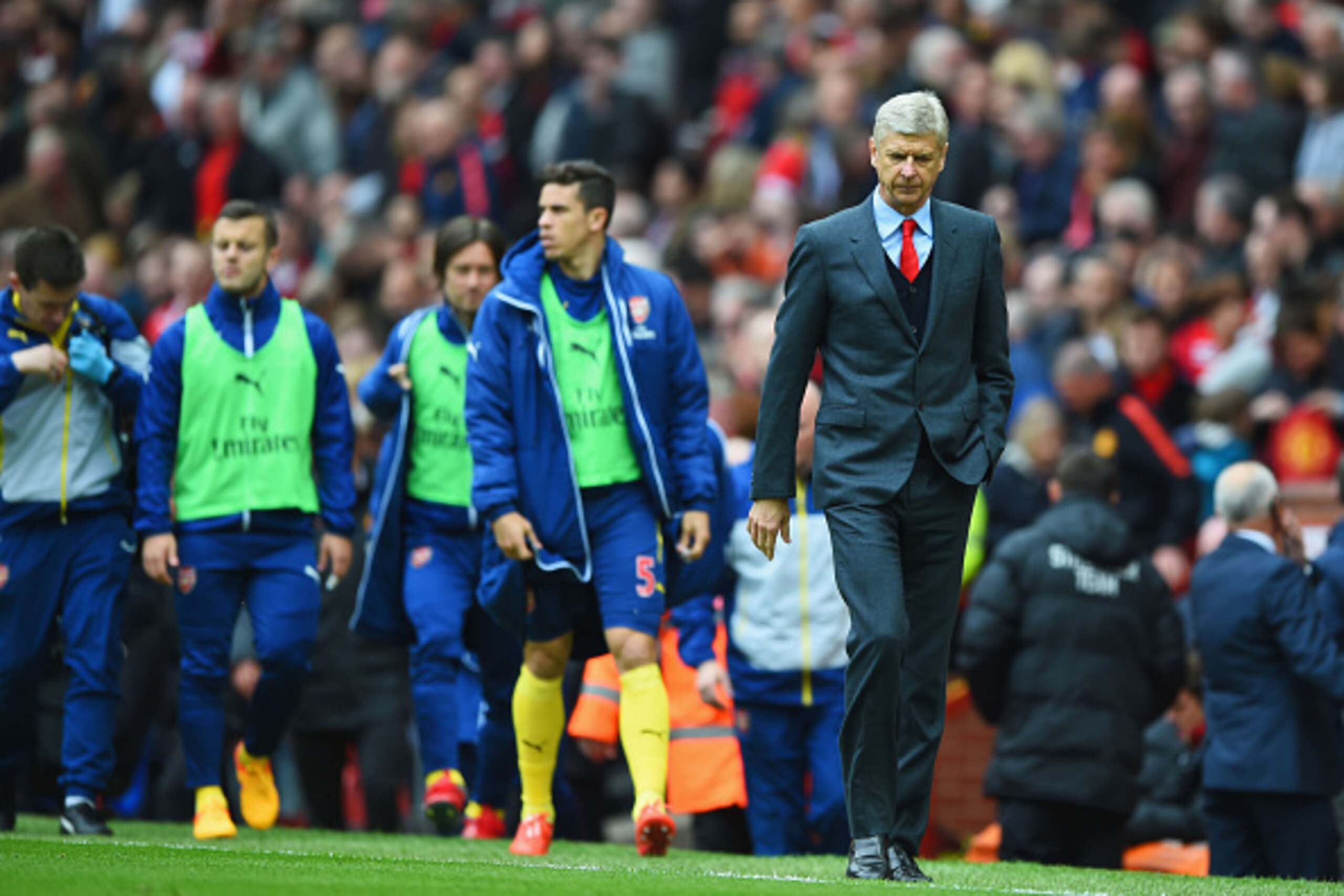 MANCHESTER, ENGLAND - MAY 17:  Arsene Wenger manager of Arsenal looks on at half time during the Barclays Premier League match between Manchester United and Arsenal at Old Trafford on May 17, 2015 in Manchester, England.  (Photo by Shaun Botterill/Getty I