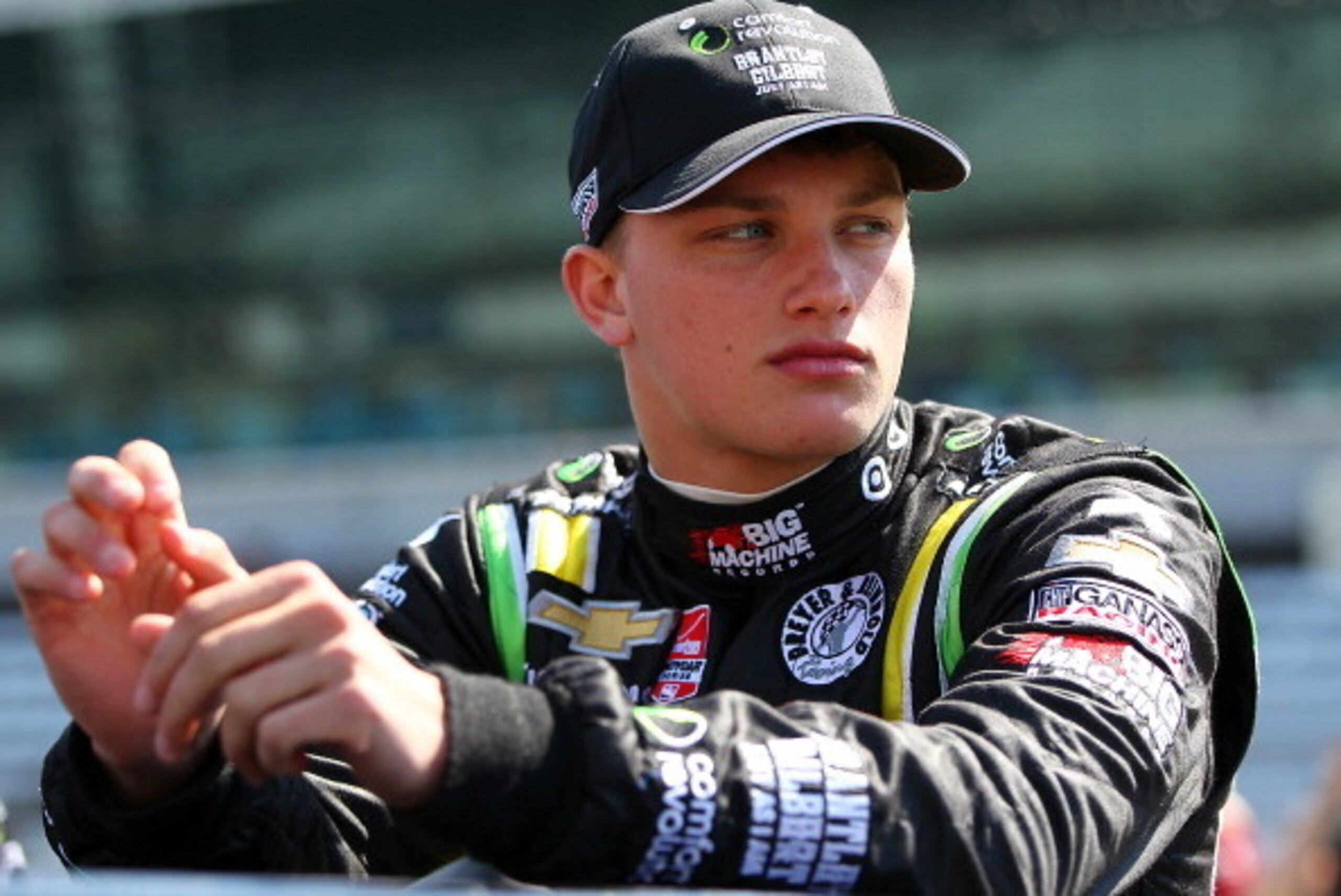 INDIANAPOLIS - MAY 18:  Sage Karam, driver of the #22 Dreyer-Reinbold Chevrolet Dallara waits to qualify for the 98th Indianapolis 500 Mile Race on May 18, 2014 at the Indianapolis Motor Speedway in Indianapolis, Indiana.  (Photo by Jonathan Ferrey/Getty 