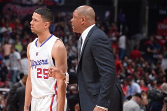 LOS ANGELES, CA - APRIL 28: Austin Rivers #25 and Doc Rivers of the Los Angeles Clippers speak during a game against the San Antonio Spurs in Game Five of the Western Conference Quarterfinals during the 2015 NBA Playoffs on April 28, 2015 at Staples Cente
