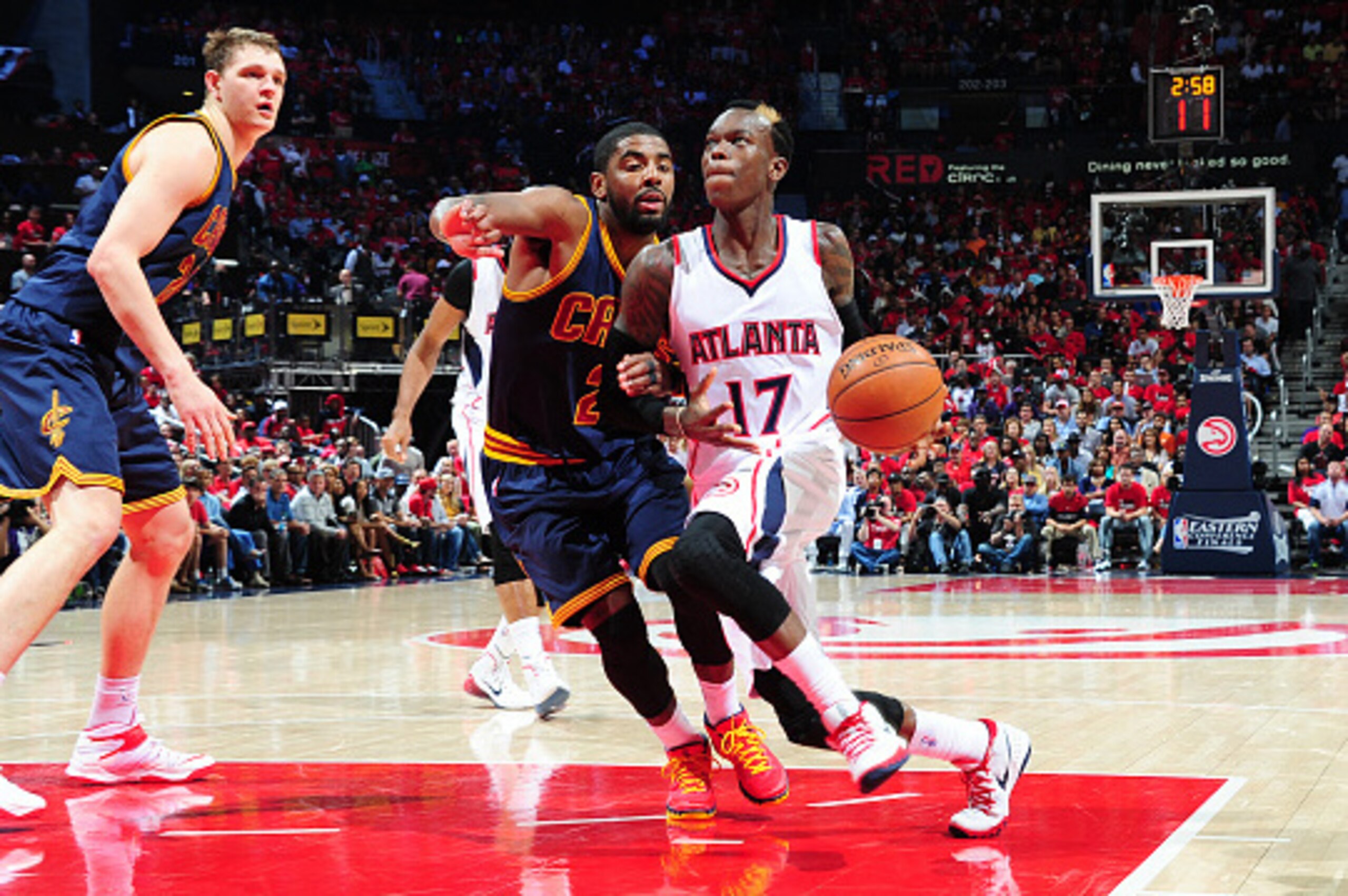 ATLANTA, GA - MAY 20: Dennis Schroder #17 of the Atlanta Hawks drives to the basket against Kyrie Irving #2 of the Cleveland Cavaliers during Game One of the Eastern Conference Finals during the NBA Playoffs on May 20, 2015 at Philips Arena in Atlanta, Ge