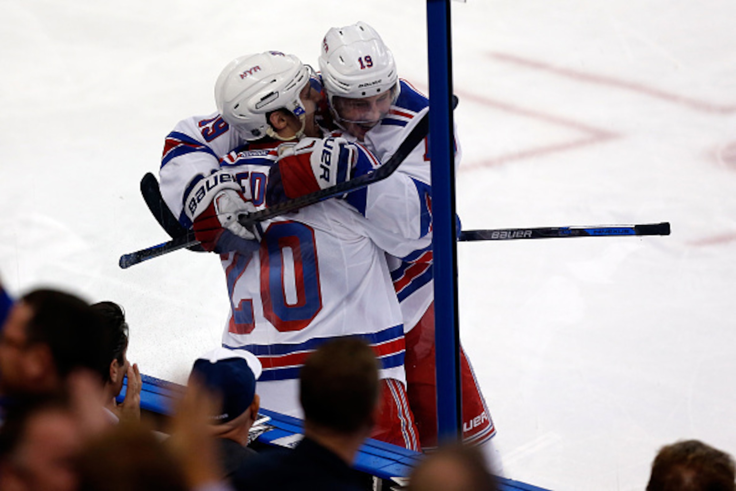 TAMPA, FL - MAY 20:  Jesper Fast #19 of the New York Rangers celebrates with teammate Chris Kreider #20 after scoring the second goal in the first period against Ben Bishop #30 of the Tampa Bay Lightning during Game Three of the Eastern Conference Finals 