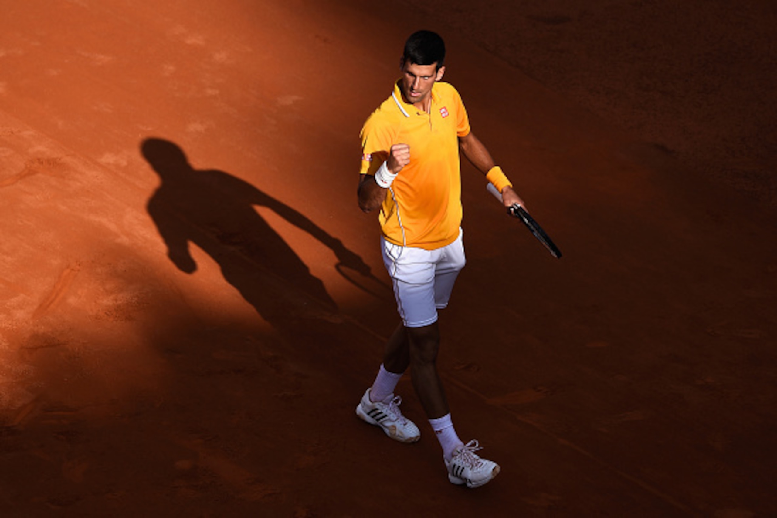 ROME, ITALY - MAY 17:  Novak Djokovic of Serbiareacts after winning a break point during his victory over Roger Federer of Switzerland in the Men's Singles Final on Day Eight of The Internazionali BNL d'Italia 2015 at the Foro Italico on May 17, 2015 in R