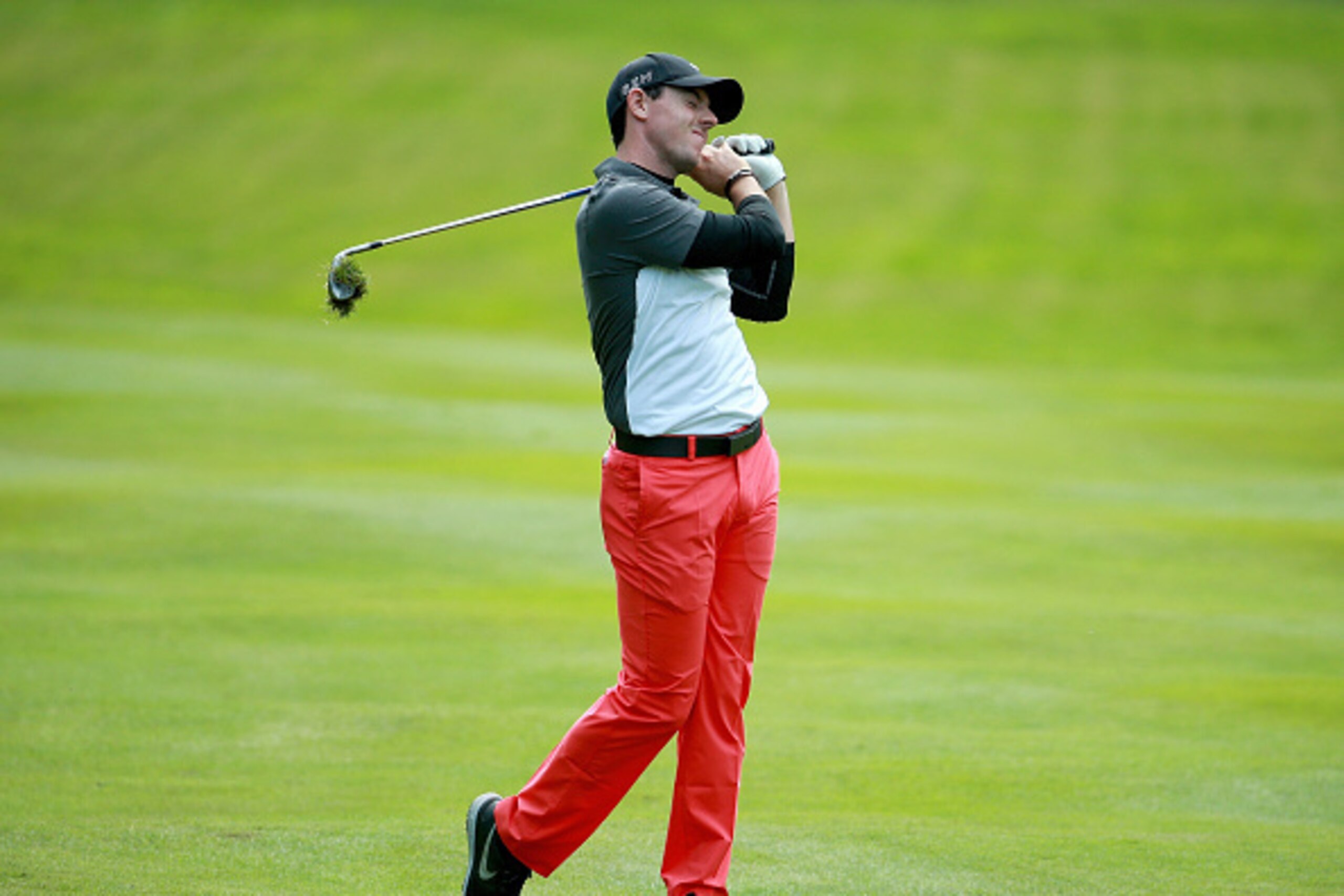 VIRGINIA WATER, ENGLAND - MAY 22:  Rory McIlroy of Northern Ireland reacts to his 2nd shot on the 16th hole during day 2 of the BMW PGA Championship at Wentworth on May 22, 2015 in Virginia Water, England.  (Photo by Warren Little/Getty Images)