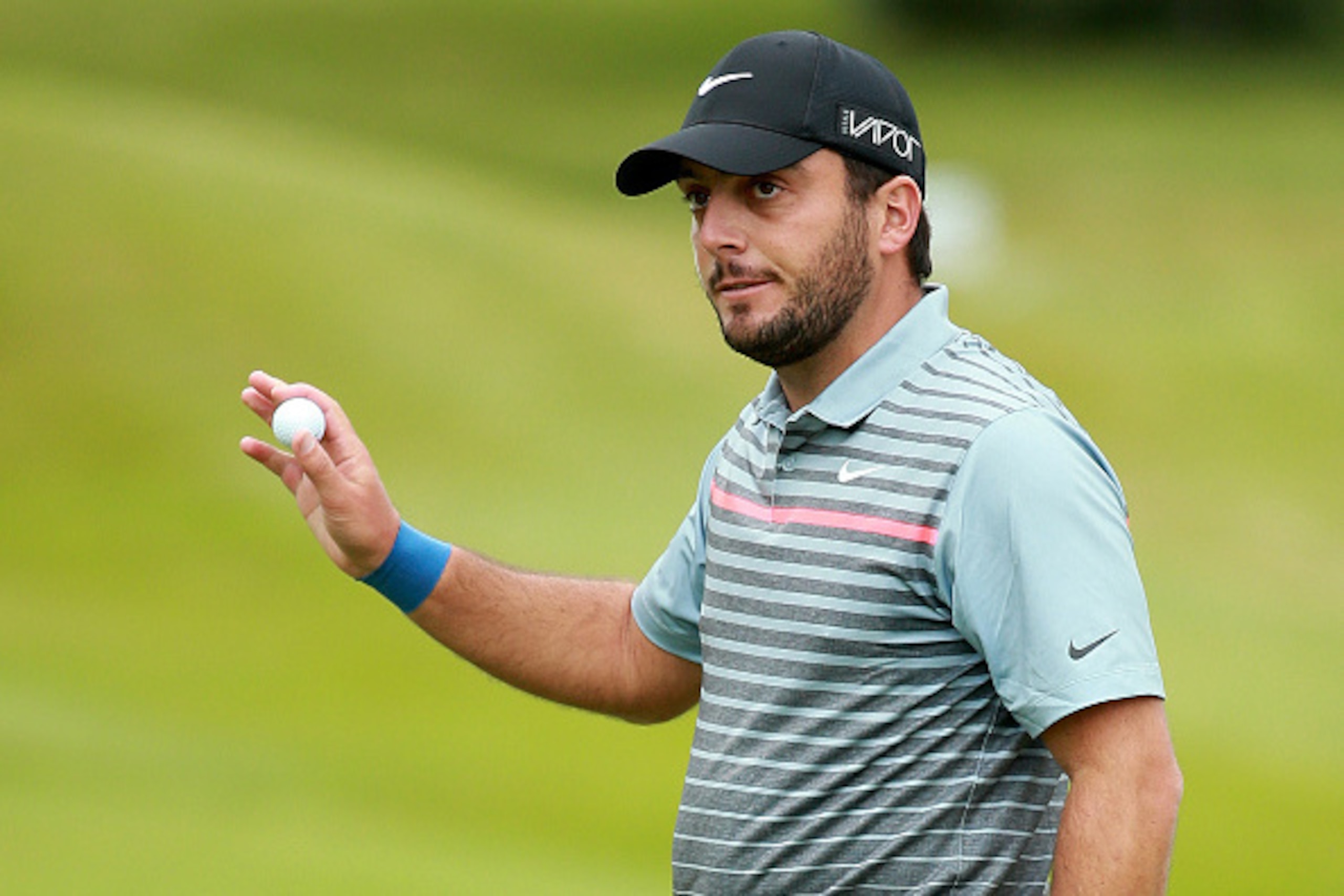 VIRGINIA WATER, ENGLAND - MAY 22:  Francesco Molinari of Italy acknowledges the crowd on the 18th green during day 2 of the BMW PGA Championship at Wentworth on May 22, 2015 in Virginia Water, England.  (Photo by Warren Little/Getty Images)