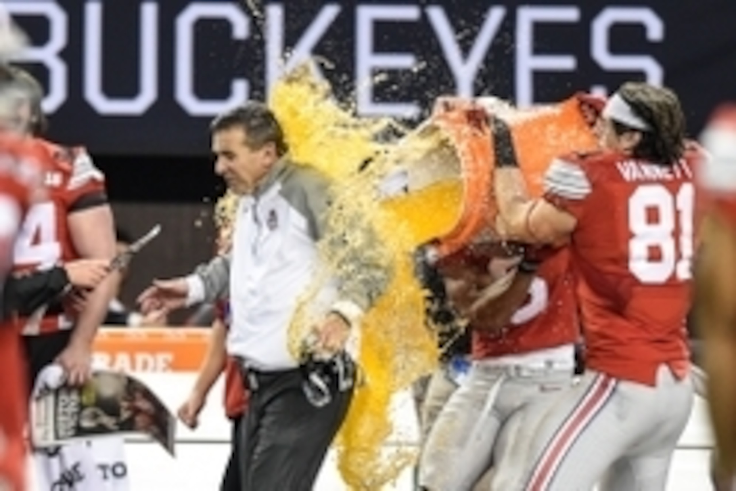 Jan 12, 2015; Arlington, TX, USA; Ohio State Buckeyes tight end Nick Vannett (81) dumps gatorade on Ohio State Buckeyes head coach Urban Meyer during the fourth quarter in the 2015 CFP National Championship Game at AT&T Stadium. Ohio State Buckeyes defeat Jan 12, 2015; Arlington, TX, USA; Ohio State Buckeyes tight end Nick Vannett (81) dumps gatorade on Ohio State Buckeyes head coach Urban Meyer during the fourth quarter in the 2015 CFP National Championship Game at AT&T Stadium. Ohio State Buckeyes defeat