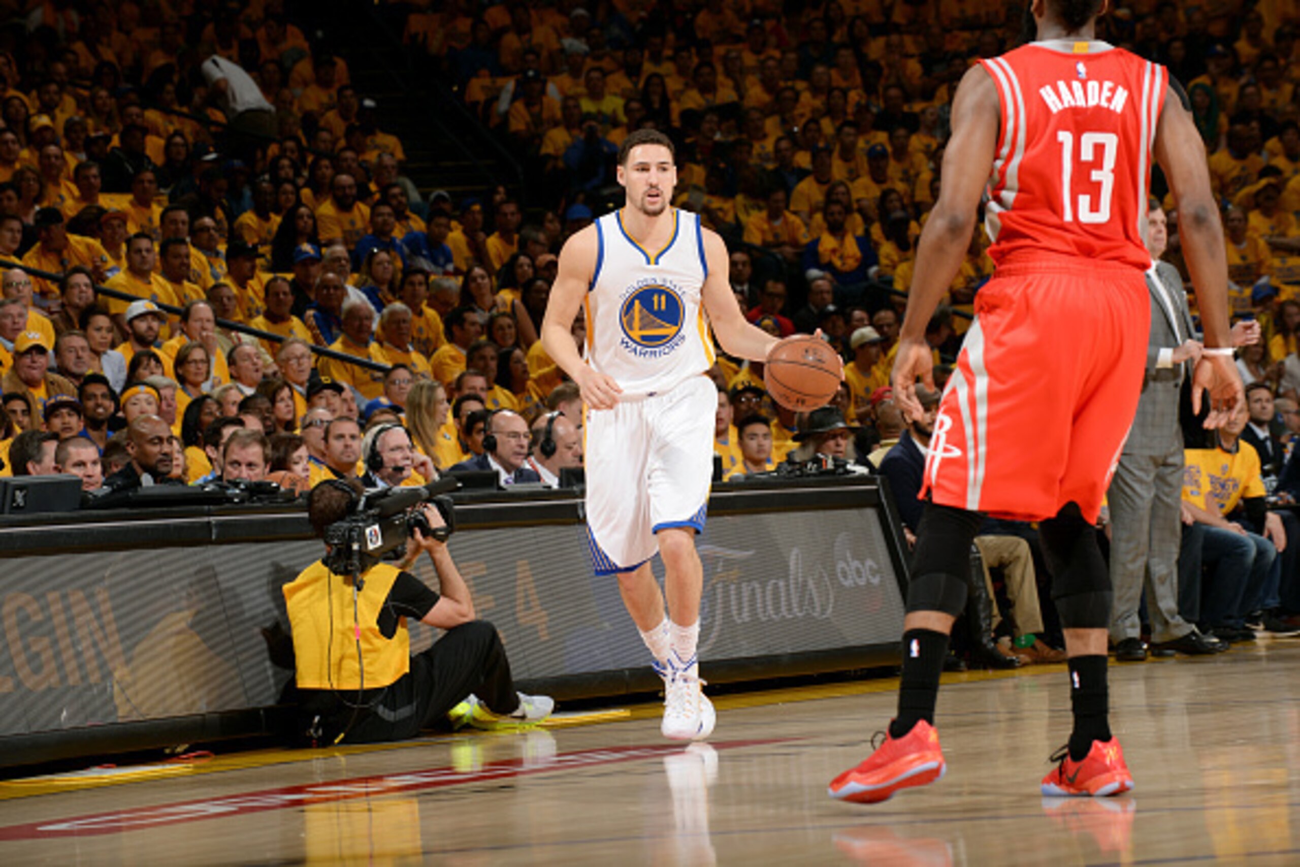 OAKLAND, CA - MAY 21: Klay Thompson #11 of the Golden State Warriors handles the ball against the Houston Rockets in Game Two of the Western Conference Finals of the 2015 NBA Playoffs on May 21, 2015 at Oracle Arena in Oakland, California. NOTE TO USER: U