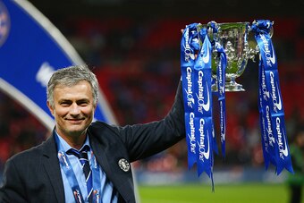 LONDON, ENGLAND - MARCH 01:  Jose Mourinho of Chelsea celebrates with the trophy after winning the Capital One Cup Final match between Chelsea and Tottenham Hotspur at Wembley Stadium on March 1, 2015 in London, England.  (Photo by Clive Mason/Getty Image