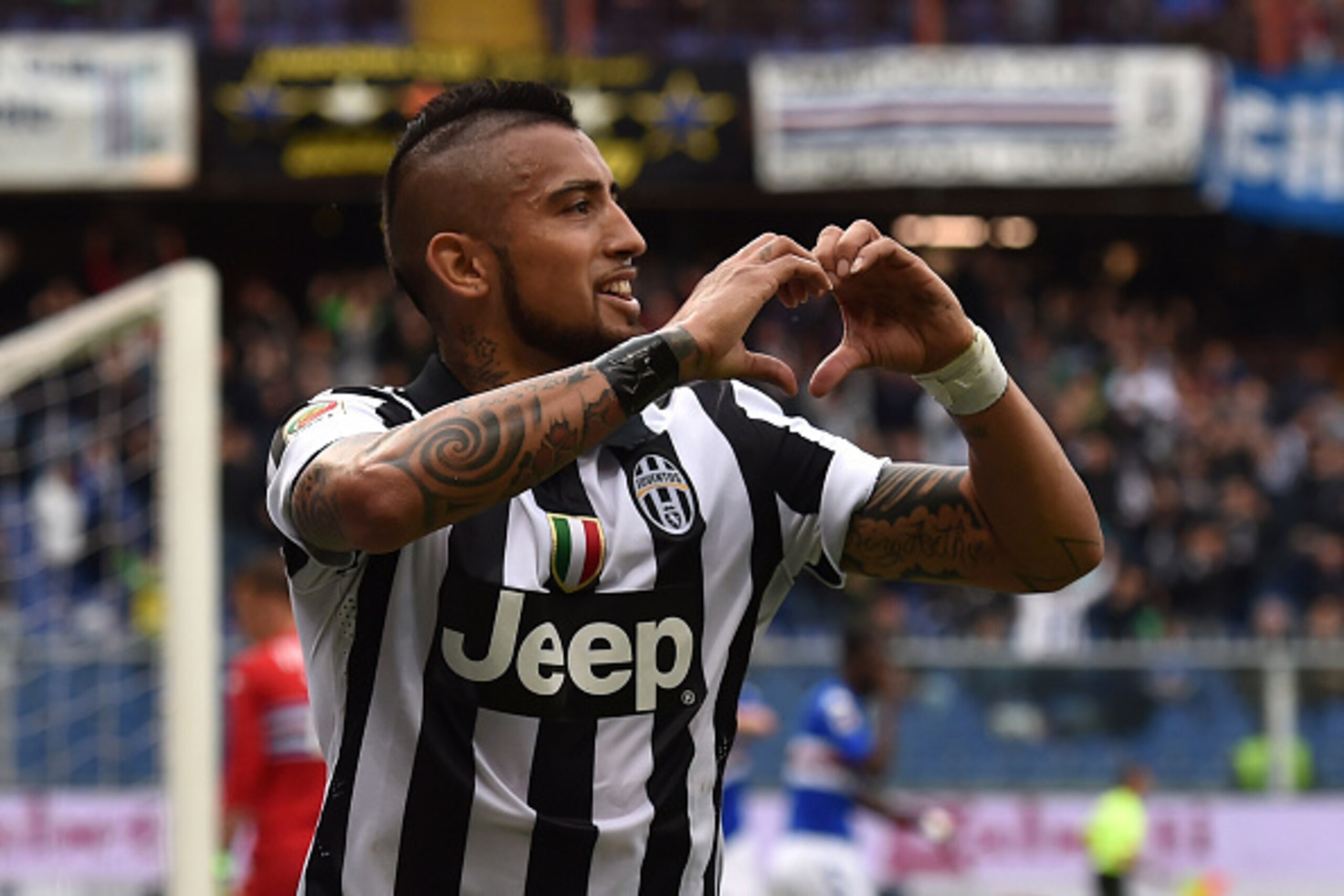 GENOA, ITALY - MAY 02:  Arturo Vidal of  Juventus FC celebrates after scoring the opening goal during the Serie A match between UC Sampdoria and Juventus FC at Stadio Luigi Ferraris on May 2, 2015 in Genoa, Italy.  (Photo by Valerio Pennicino/Getty Images