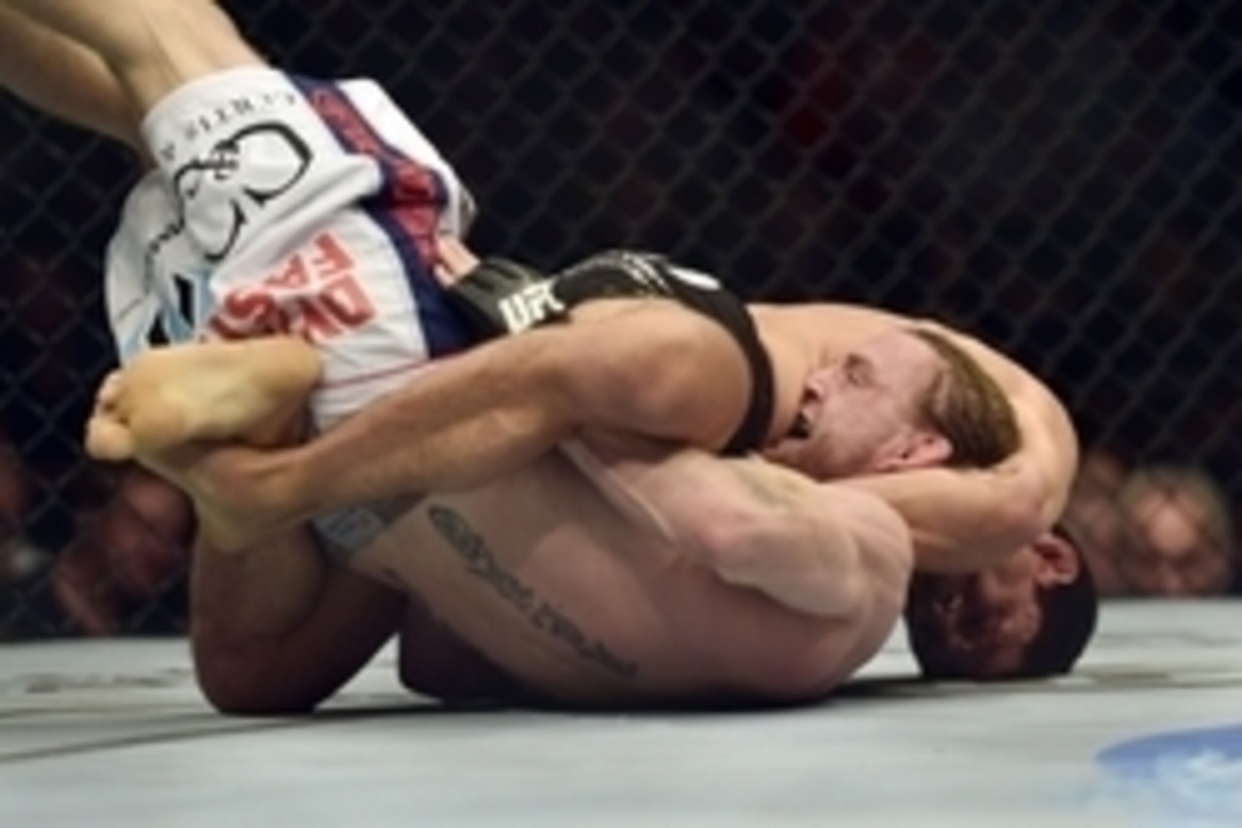Apr 26, 2014; Baltimore, MD, USA;  Timothy Elliot (bottom)  is submitted  by Joseph Benavidez during the first round in UFC 172 at Baltimore Arena. Mandatory Credit: Tommy Gilligan-USA TODAY Sports