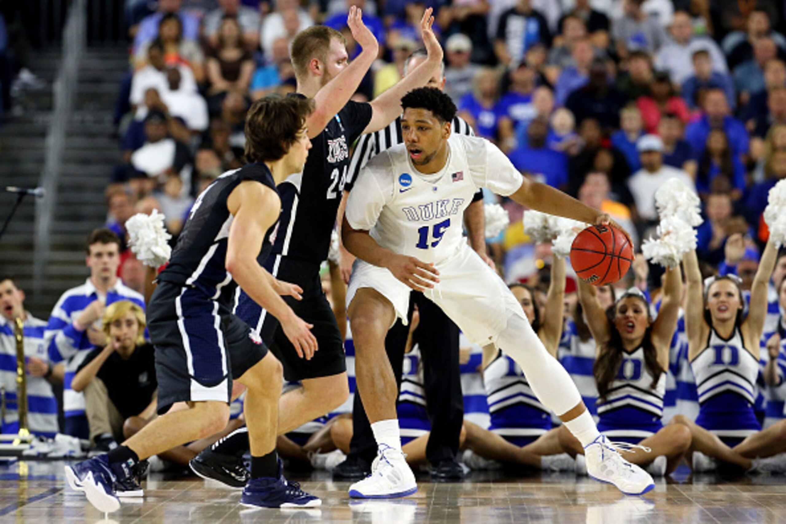 HOUSTON, TX - MARCH 29:  Jahlil Okafor #15 of the Duke Blue Devils drives to the basket against Przemek Karnowski #24 of the Gonzaga Bulldogs during the South Regional Final of the 2015 NCAA Men's Basketball Tournament at NRG Stadium on March 29, 2015 in 