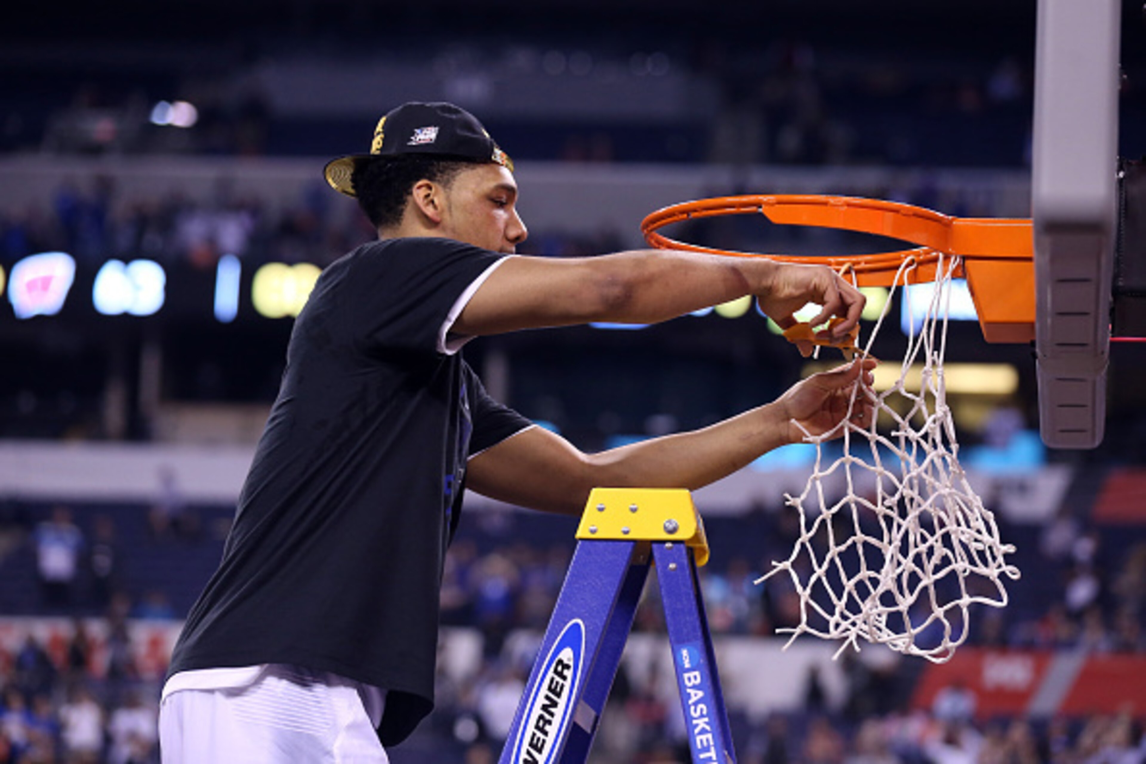 INDIANAPOLIS, IN - APRIL 06:  Jahlil Okafor #15 of the Duke Blue Devils cuts down the net after defeating the Wisconsin Badgers during the NCAA Men's Final Four National Championship at Lucas Oil Stadium on April 6, 2015 in Indianapolis, Indiana.  Duke de