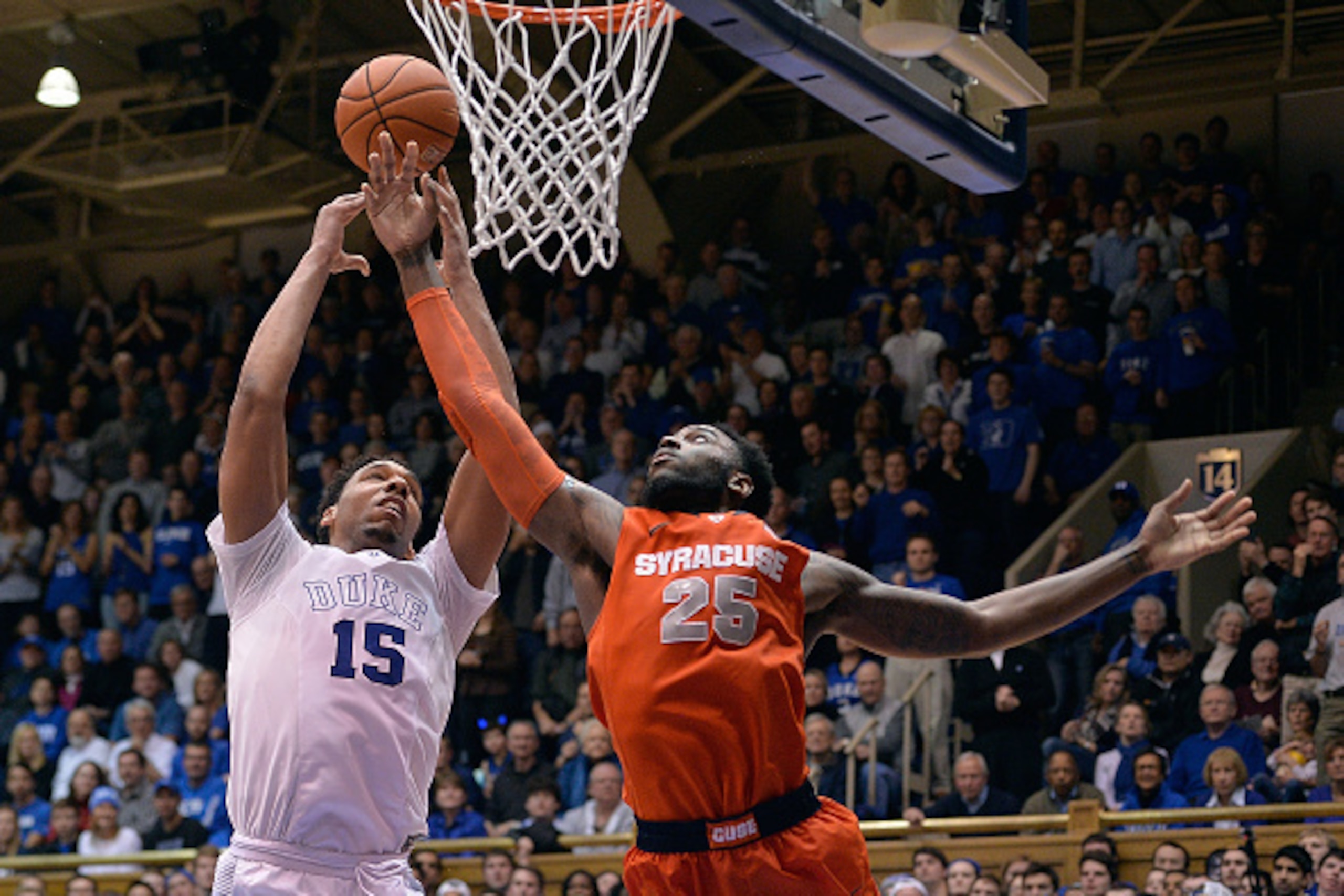 DURHAM, NC - FEBRUARY 28:  Rakeem Christmas #25 of the Syracuse Orange battles Jahlil Okafor #15 of the Duke Blue Devils for a rebound during their game at Cameron Indoor Stadium on February 28, 2015 in Durham, North Carolina. Duke won 73-54.  (Photo by G