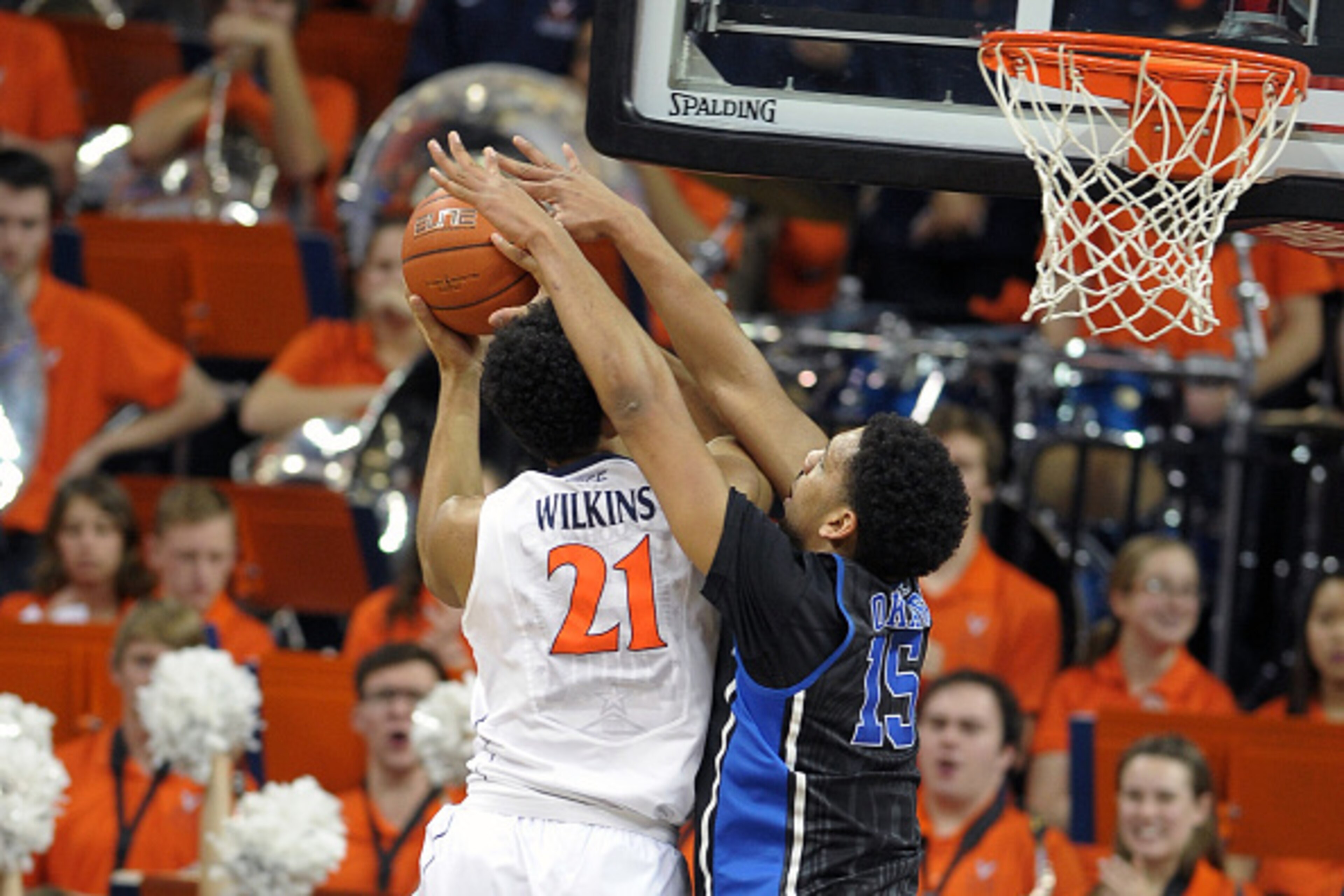 CHARLOTTESVILLE, VA - JANUARY 31: Jahlil Okafor #15 of the Duke Blue Devils defends a shot by Isaiah Wilkins #21 of the Virginia Cavaliers at John Paul Jones Arena on January 31, 2015 in Charlottesville, Virginia. (Photo by Lance King/Getty Images)