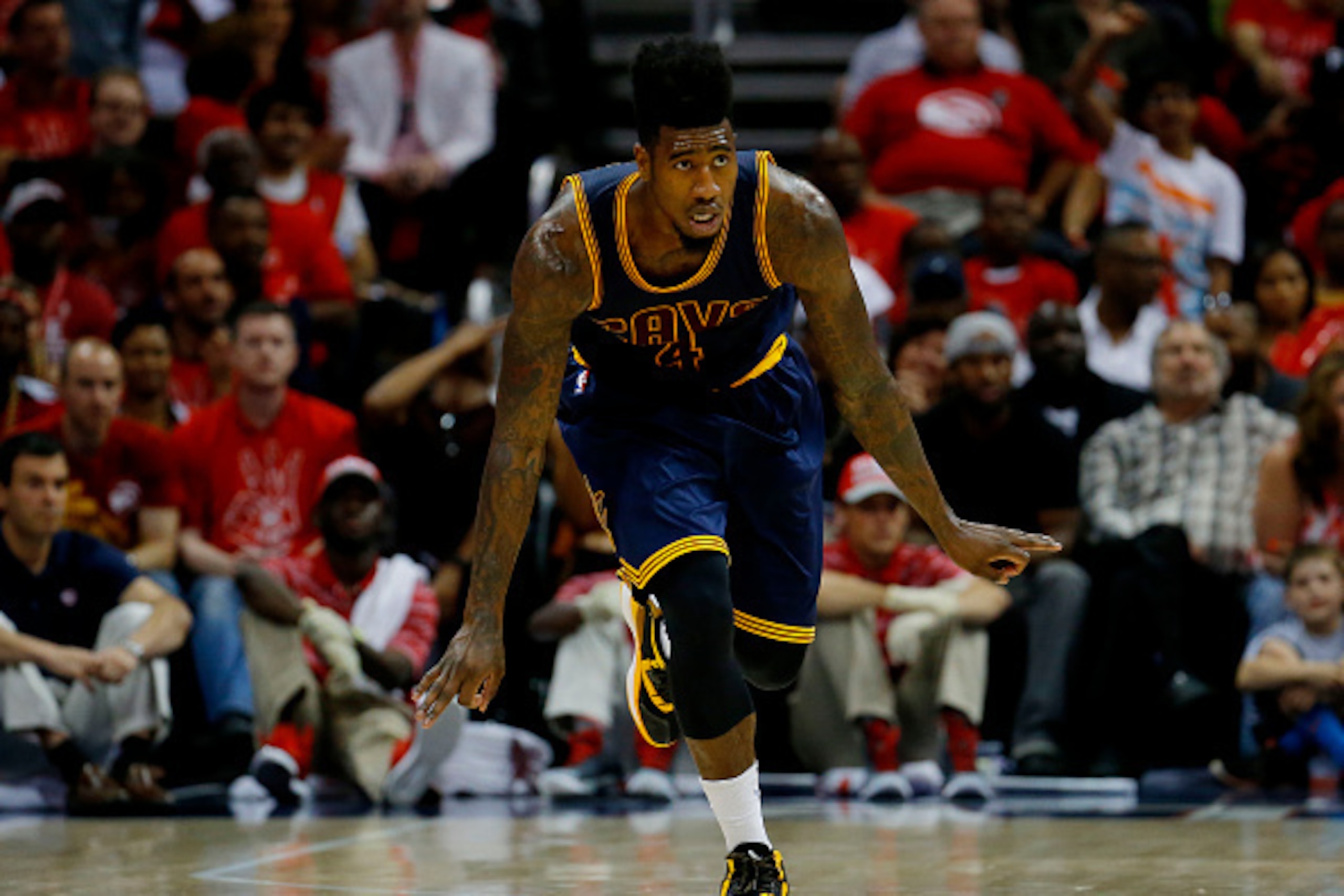 ATLANTA, GA - MAY 22:  Iman Shumpert #4 of the Cleveland Cavaliers celebrates after hitting a three pointer in the third quarter against the Atlanta Hawks during Game Two of the Eastern Conference Finals of the 2015 NBA Playoffs at Philips Arena on May 22