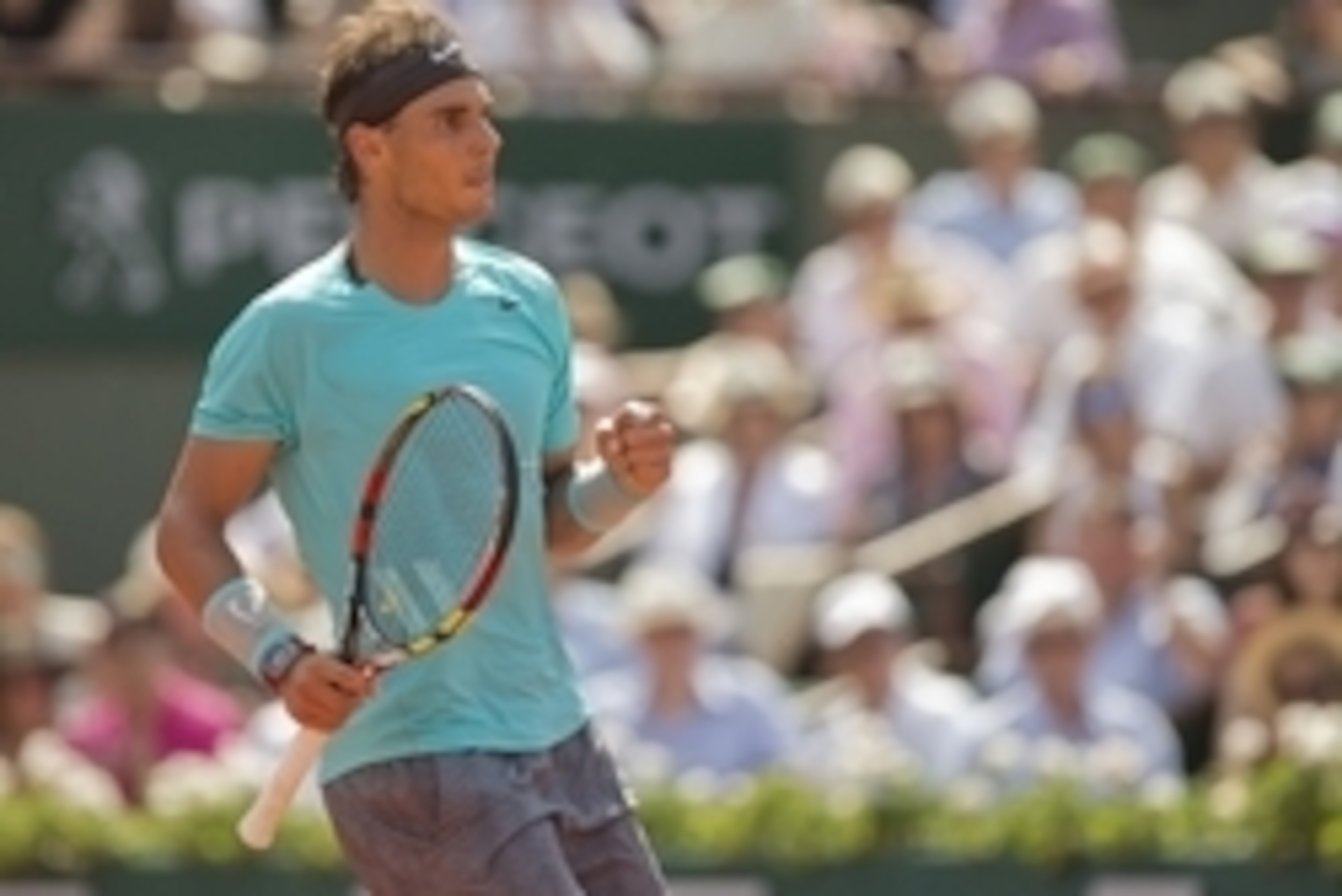 Jun 8, 2014; Paris, France; Rafael Nadal (ESP) reacts during his match against Novak Djokovic (SRB) on day 15 at the 2014 French Open at Roland Garros. Mandatory Credit: Susan Mullane-USA TODAY Sports