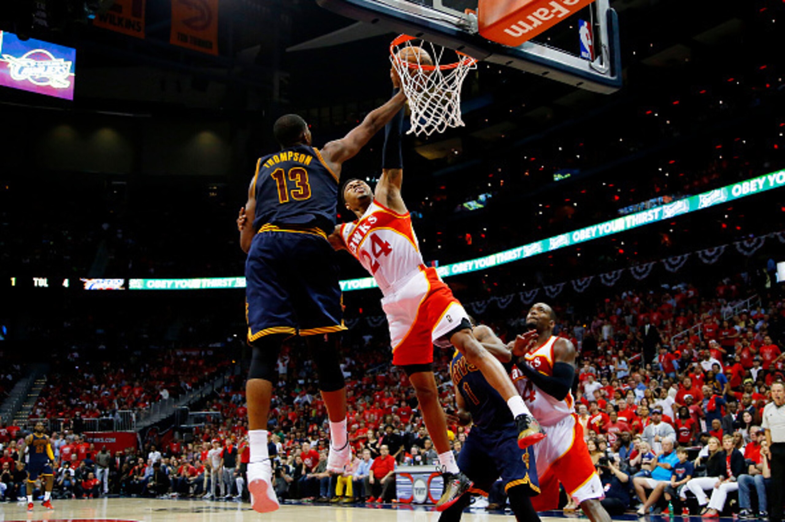 ATLANTA, GA - MAY 22:  Kent Bazemore #24 of the Atlanta Hawks goes up against Tristan Thompson #13 of the Cleveland Cavaliers in the third quarter during Game Two of the Eastern Conference Finals of the 2015 NBA Playoffs at Philips Arena on May 22, 2015 i