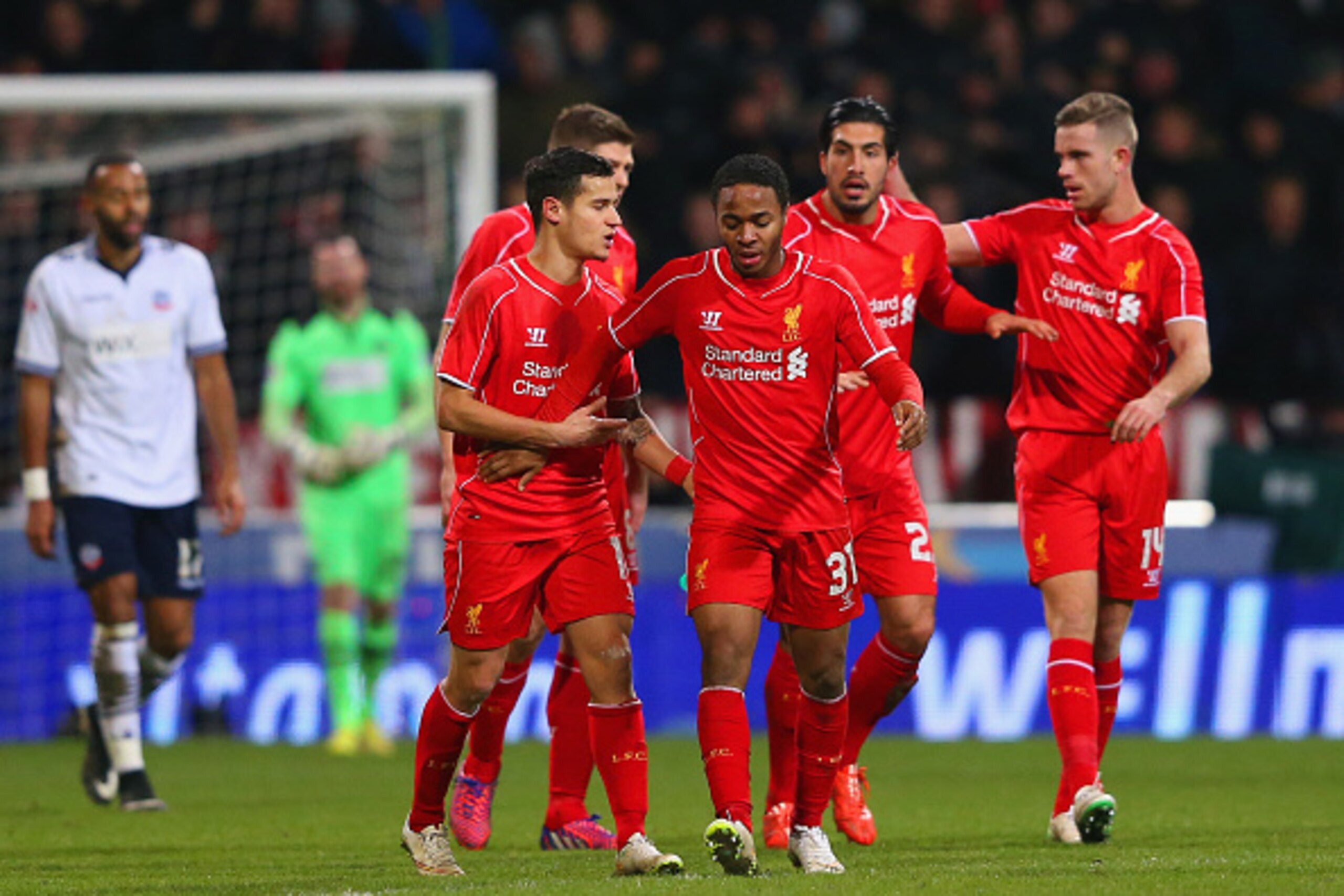 BOLTON, ENGLAND - FEBRUARY 04:  Raheem Sterling of Liverpool (C) celebrates scoring their first goal with team mates during the FA Cup Fourth round replay between Bolton Wanderers and Liverpool at Macron Stadium on February 4, 2015 in Bolton, England.  (P