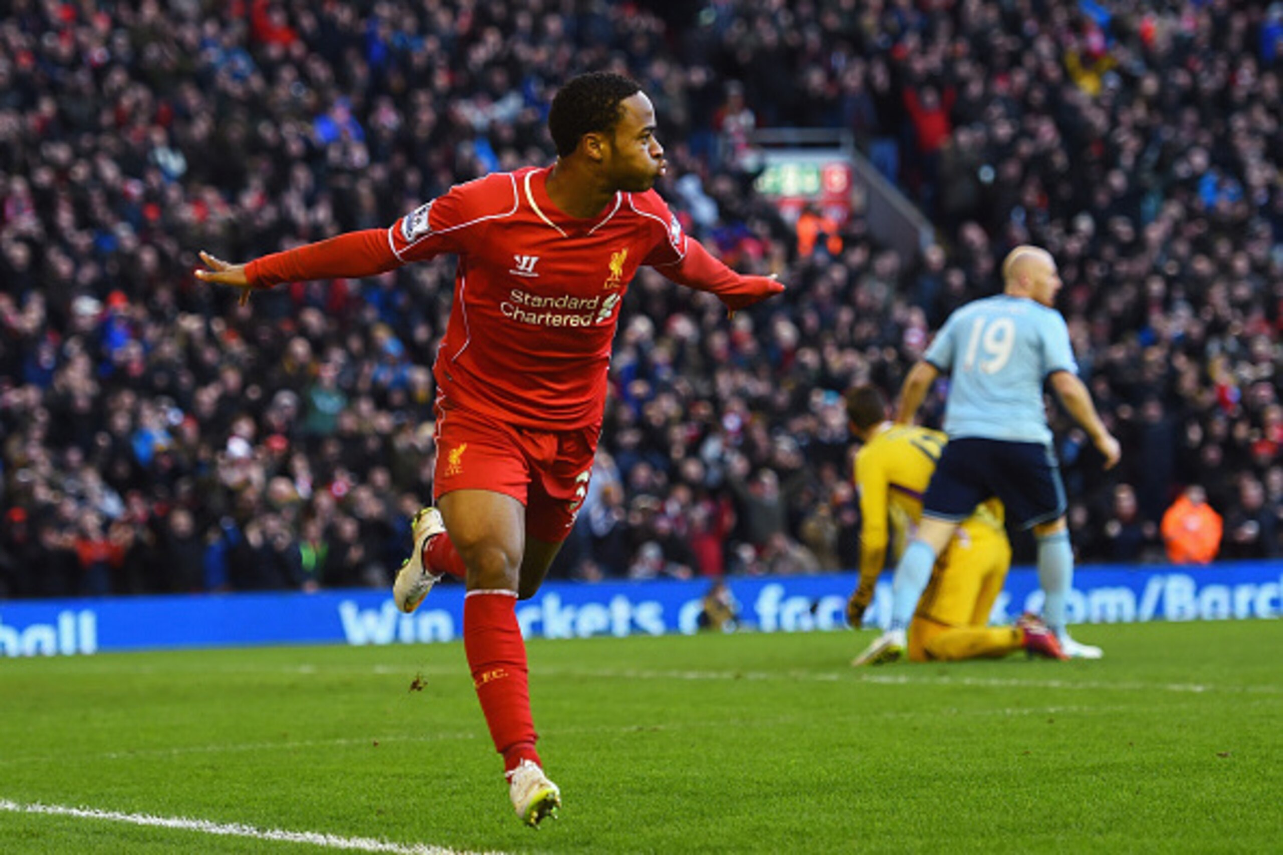 LIVERPOOL, ENGLAND - JANUARY 31:  Raheem Sterling of Liverpool celebrates scoring the opening goal during the Barclays Premier League match between Liverpool and West Ham United at Anfield on January 31, 2015 in Liverpool, England.  (Photo by Shaun Botter