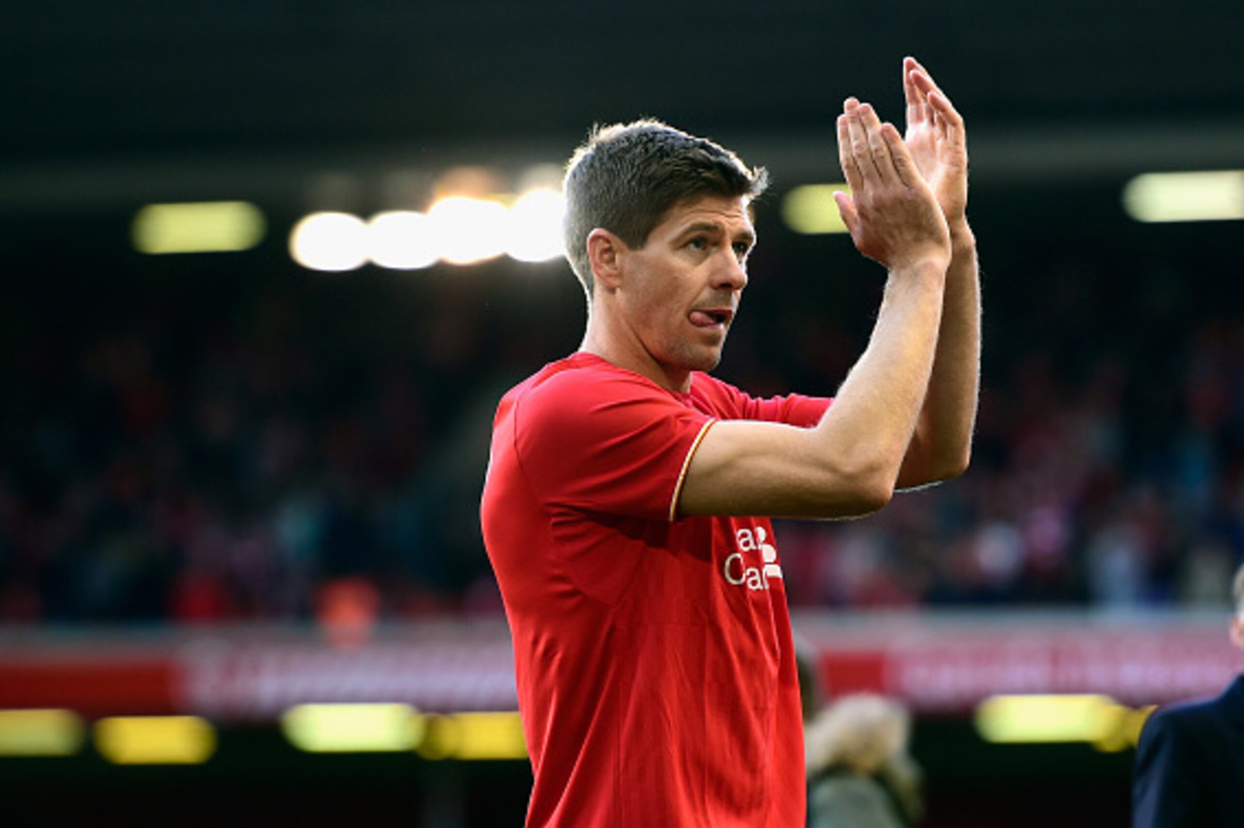 LIVERPOOL, ENGLAND - MAY 16:  Steven Gerrard of Liverpool applauds the Kop end after he Barclays Premier League match betrween Liverpool and Crystal Palace at Anfield on May 16, 2015 in Liverpool, England.  (Photo by Stu Forster/Getty Images)