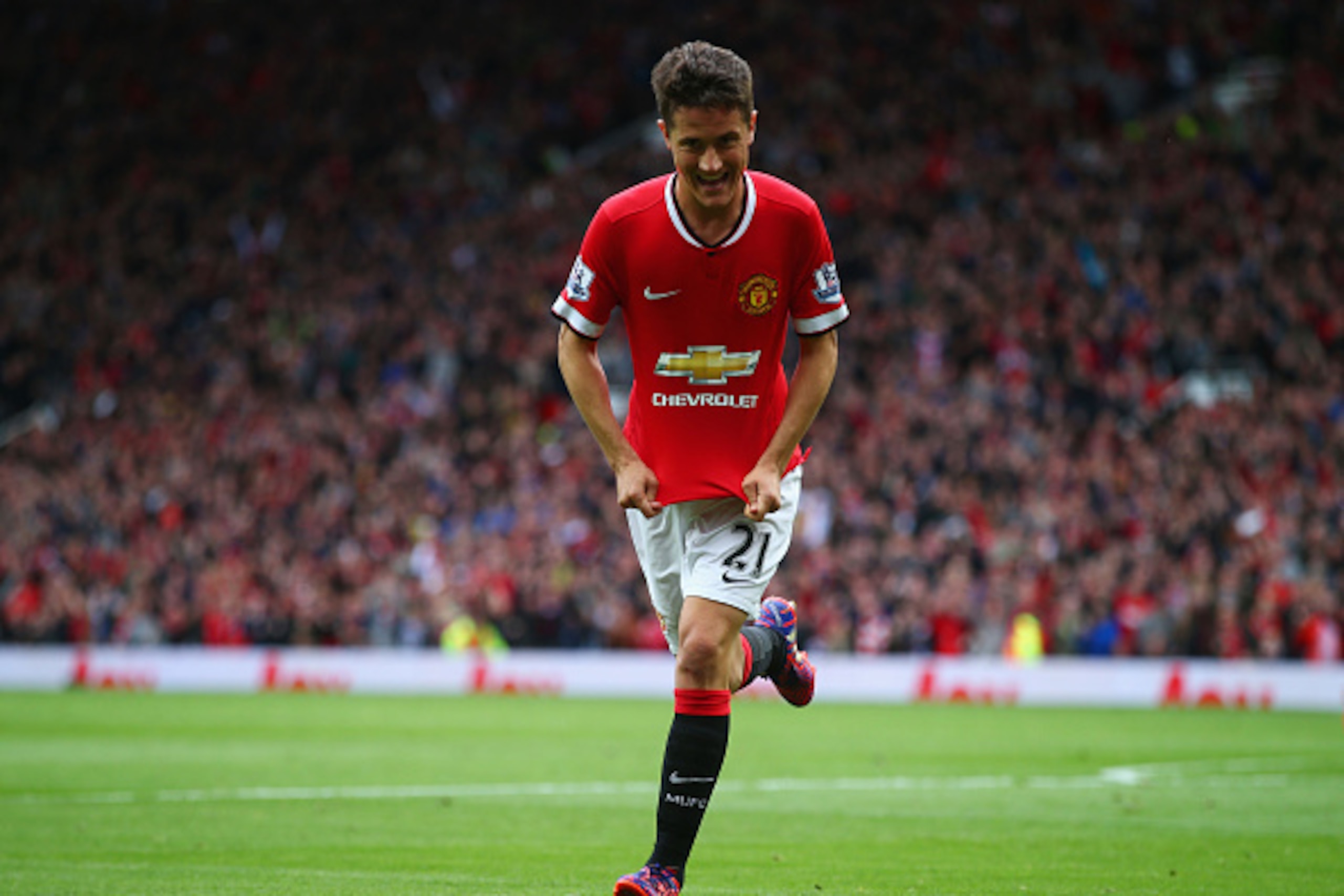 MANCHESTER, ENGLAND - MAY 17:  Ander Herrera of Manchester United celebrates as he scores their first goal during the Barclays Premier League match between Manchester United and Arsenal at Old Trafford on May 17, 2015 in Manchester, England.  (Photo by Cl
