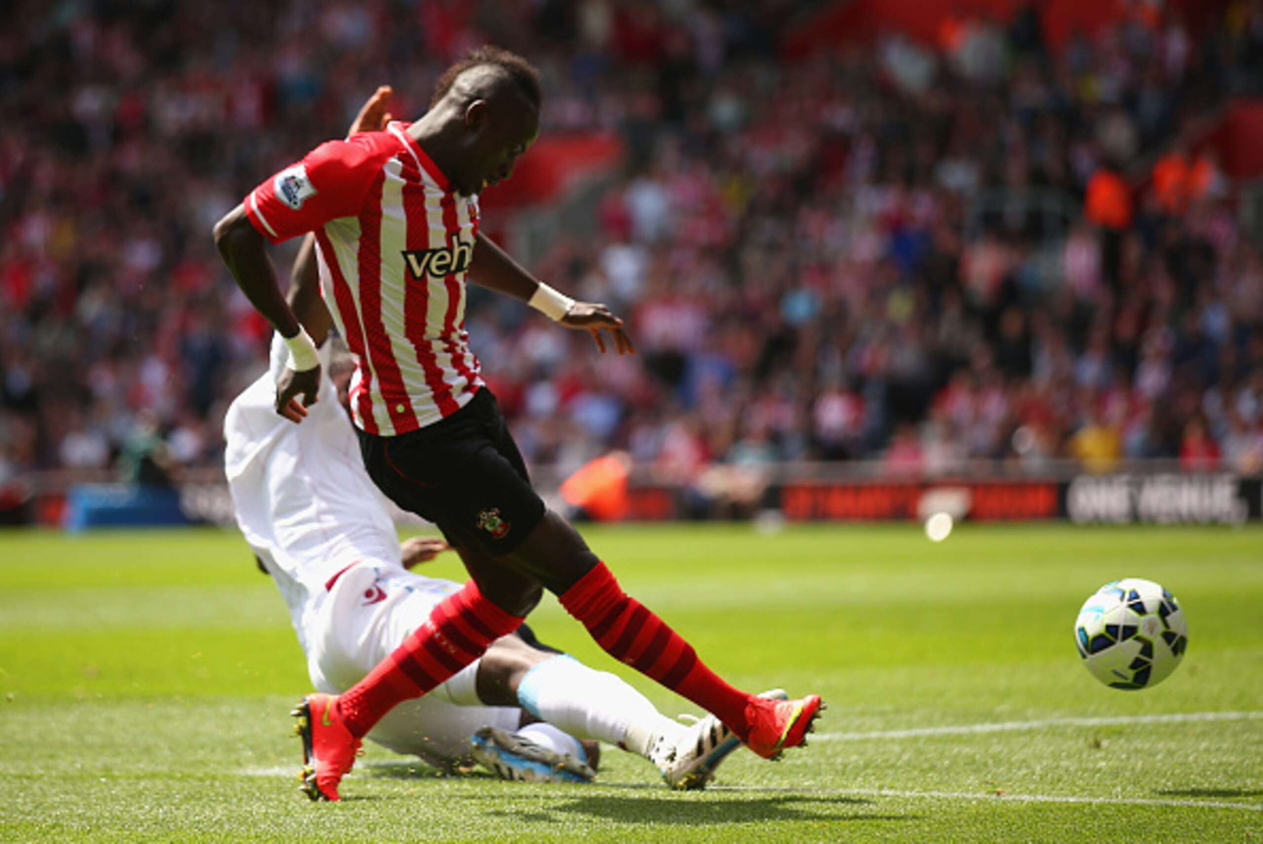 SOUTHAMPTON, ENGLAND - MAY 16: Sadio Mane of Southampton scores his second goal during the Barclays Premier League match between Southampton and Aston Villa at St Mary's Stadium on May 16, 2015 in Southampton, England. (Photo by Bryn Lennon/Getty Images) SOUTHAMPTON, ENGLAND - MAY 16: Sadio Mane of Southampton scores his second goal during the Barclays Premier League match between Southampton and Aston Villa at St Mary's Stadium on May 16, 2015 in Southampton, England. (Photo by Bryn Lennon/Getty Images)