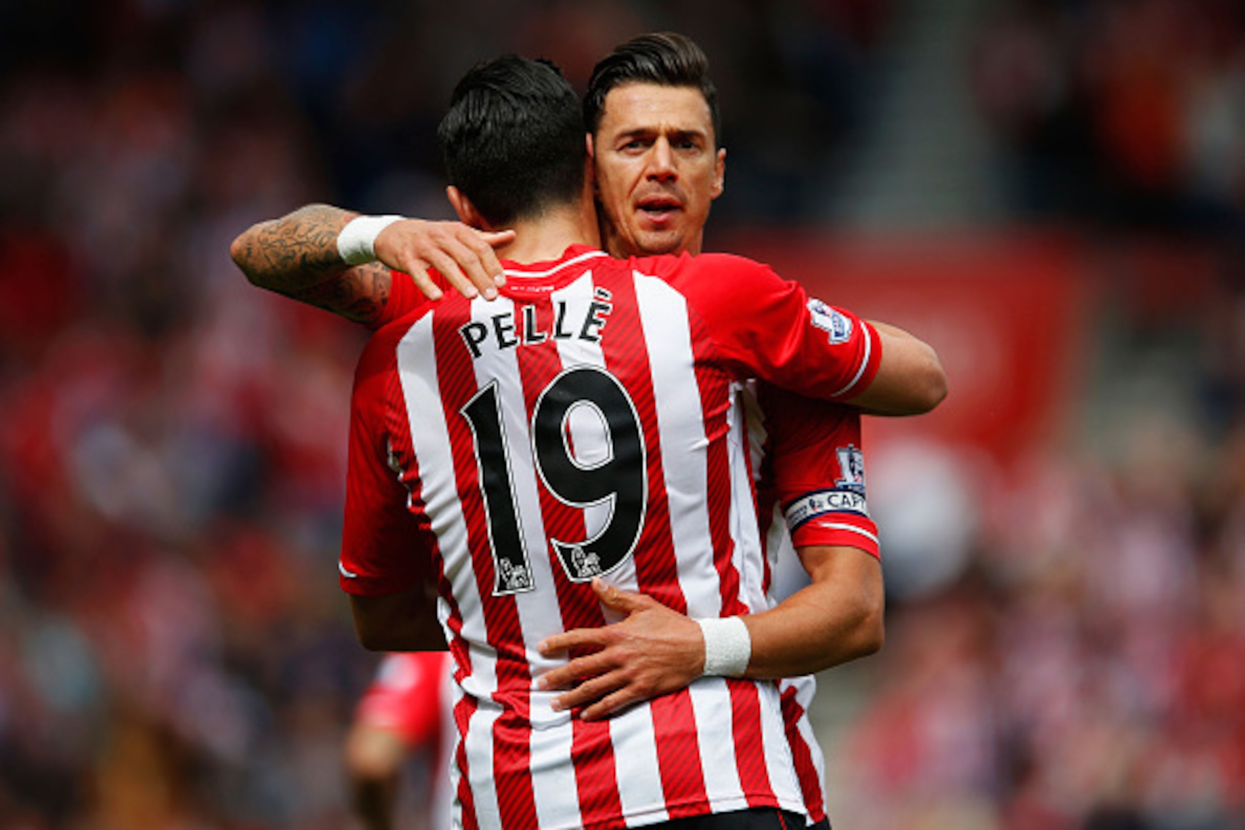 SOUTHAMPTON, ENGLAND - APRIL 25: Graziano Pelle of Southampton (19) celebrates with Jose Fonte as he scores their second goal with a header during the Barclays Premier League match between Southampton and Tottenham Hotspur at St Mary's Stadium on April 2 SOUTHAMPTON, ENGLAND - APRIL 25: Graziano Pelle of Southampton (19) celebrates with Jose Fonte as he scores their second goal with a header during the Barclays Premier League match between Southampton and Tottenham Hotspur at St Mary's Stadium on April 2