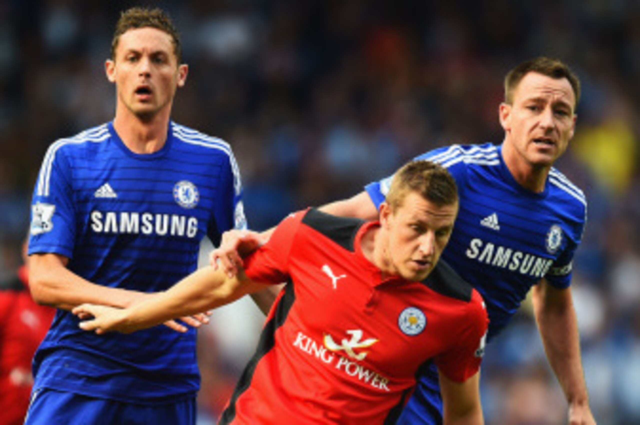 LONDON, ENGLAND - AUGUST 23: Chris Wood of Leicester City is closed down by Nemanja Matic (L) and John Terry of Chelsea during the Barclays Premier League match between Chelsea and Leicester City at Stamford Bridge on August 23, 2014 in London, England.  