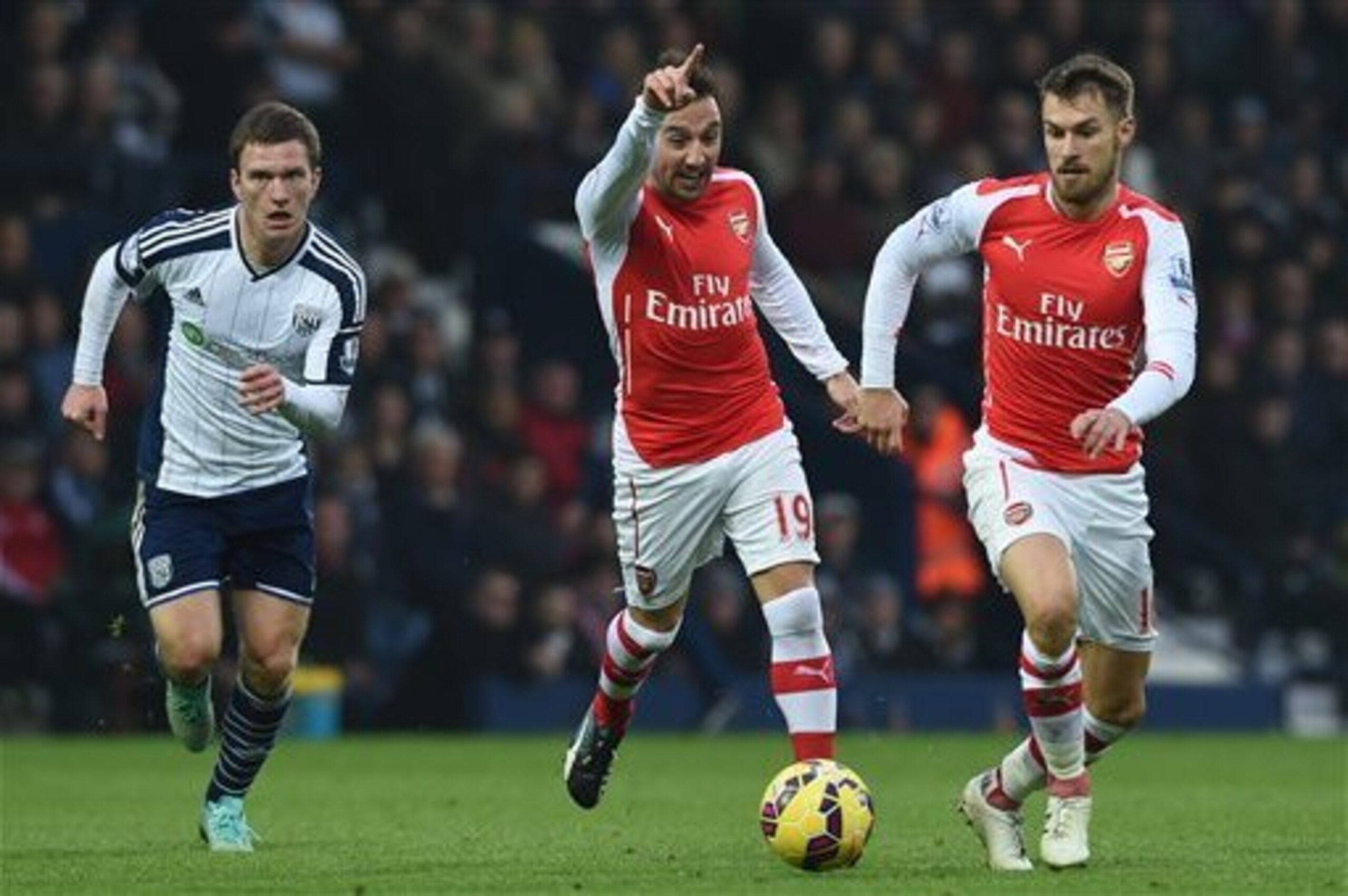 Ramsey (R) wants his place back from Cazorla.