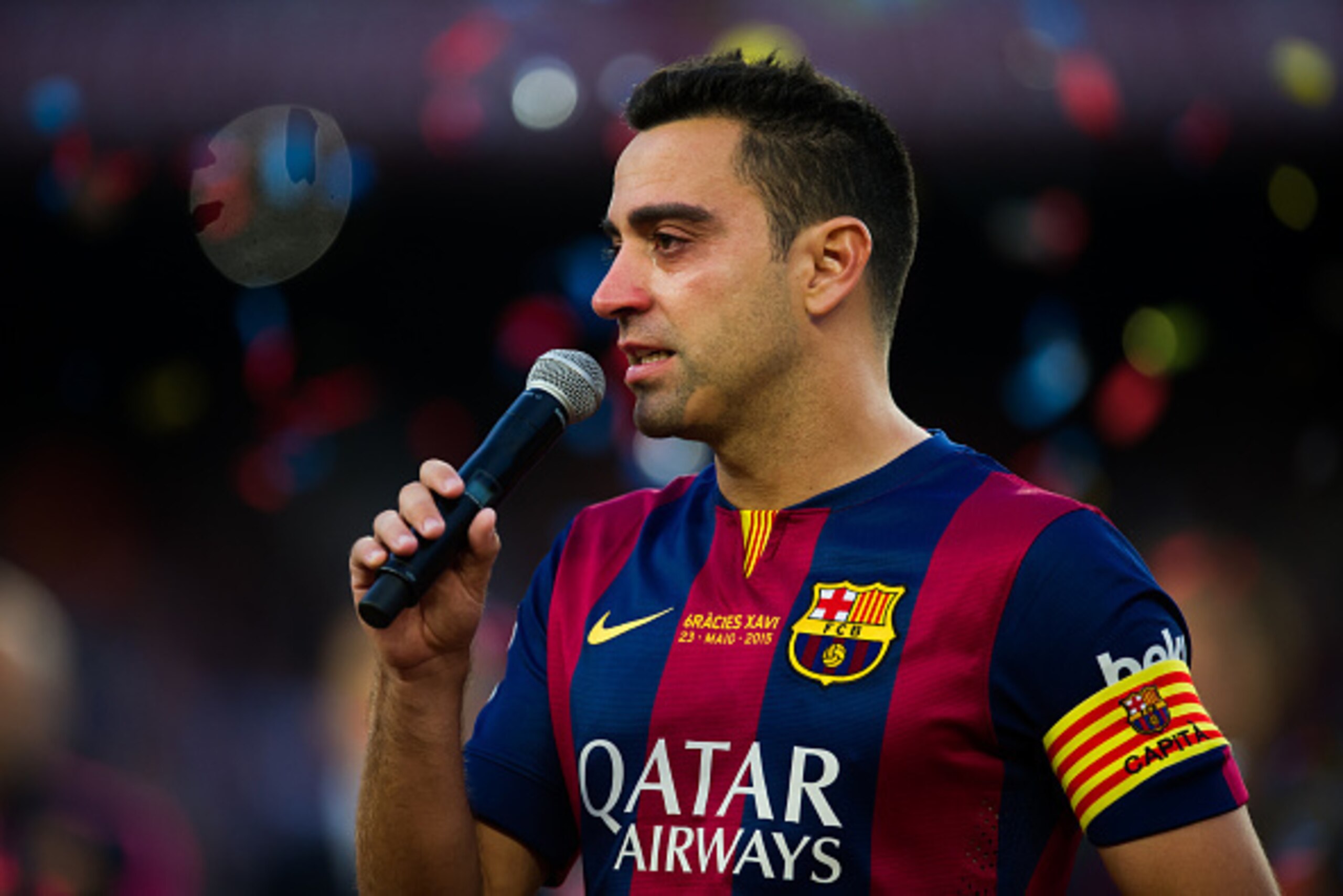 BARCELONA, SPAIN - MAY 23:  Xavi Hernandez of FC Barcelona cries as he speaks to the spectators after the La Liga match between FC Barcelona and RC Deportivo La Coruna at Camp Nou on May 23, 2015 in Barcelona, Spain.  (Photo by Alex Caparros/Getty Images)