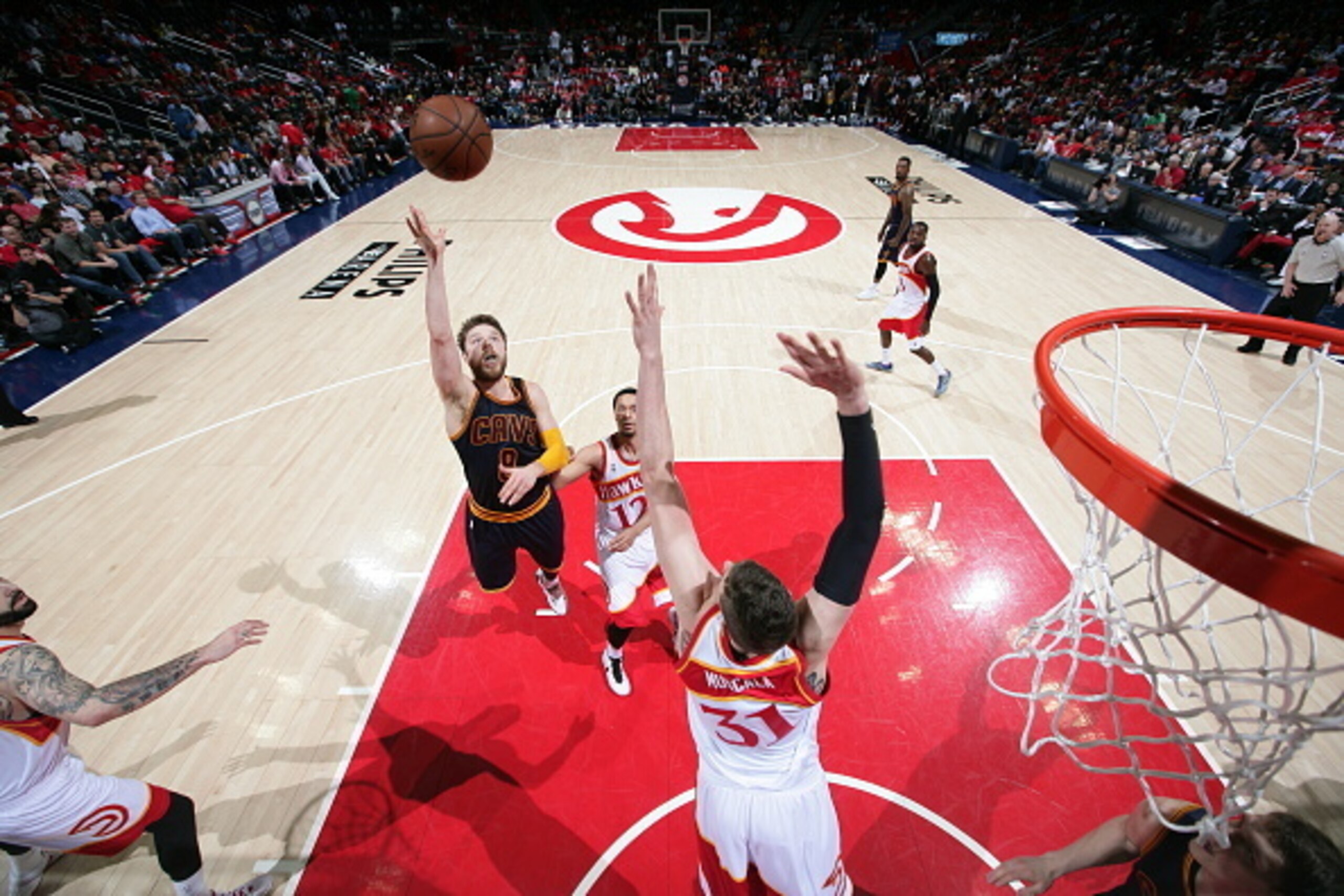 ATLANTA, GA - MAY 22: Matthew Dellavedova #8 of the Cleveland Cavaliers shoots against the Atlanta Hawks in Game Two of the Eastern Conference Finals during the 2015 NBA Playoffs on May 22, 2015 at the Philips Arena in Atlanta, Georgia. NOTE TO USER: Us ATLANTA, GA - MAY 22: Matthew Dellavedova #8 of the Cleveland Cavaliers shoots against the Atlanta Hawks in Game Two of the Eastern Conference Finals during the 2015 NBA Playoffs on May 22, 2015 at the Philips Arena in Atlanta, Georgia. NOTE TO USER: Us