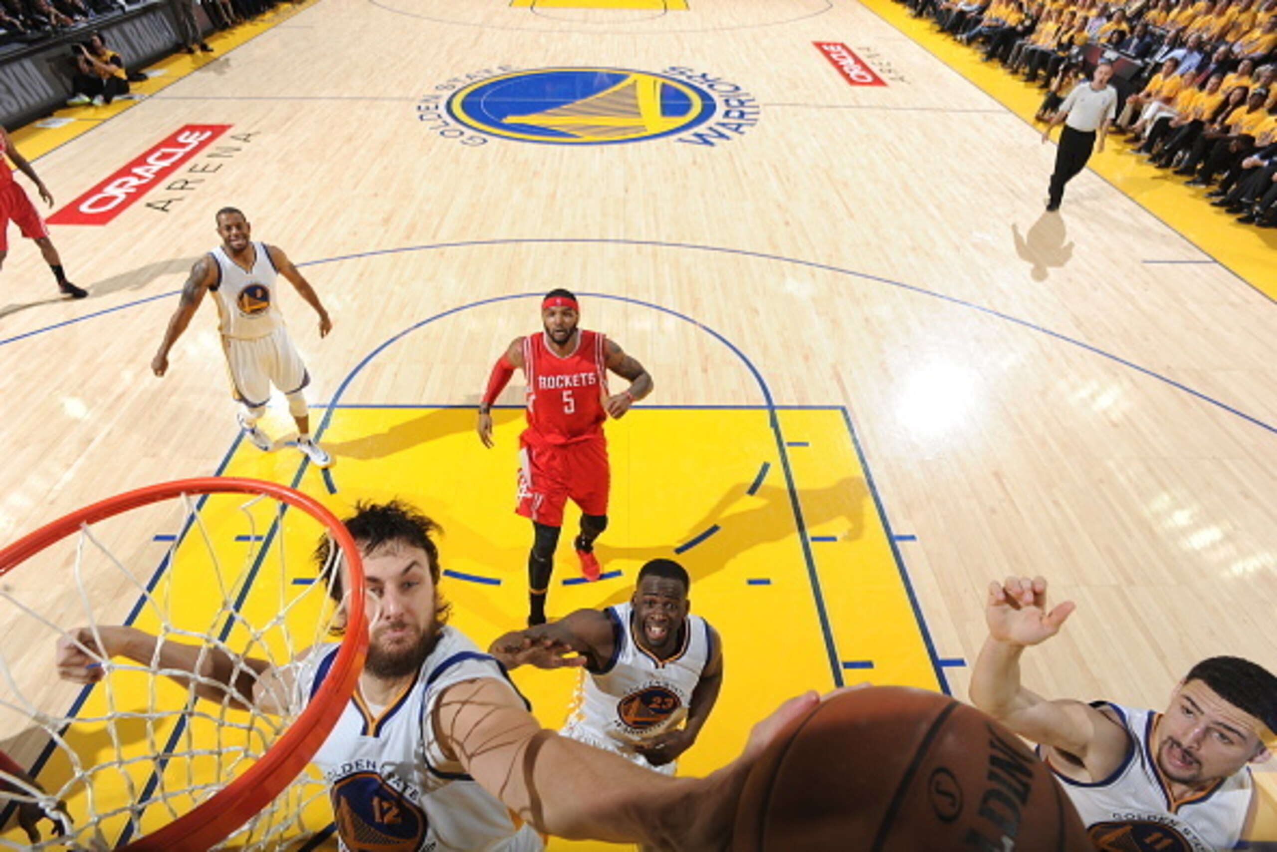 OAKLAND, CA - MAY 21: Andrew Bogut #12 of the Golden State Warriors grabs the rebound against the Houston Rockets in Game Two of the Western Conference Finals during the 2015 NBA Playoffs on May 21, 2015 at ORACLE Arena in Oakland, California. NOTE TO US OAKLAND, CA - MAY 21: Andrew Bogut #12 of the Golden State Warriors grabs the rebound against the Houston Rockets in Game Two of the Western Conference Finals during the 2015 NBA Playoffs on May 21, 2015 at ORACLE Arena in Oakland, California. NOTE TO US