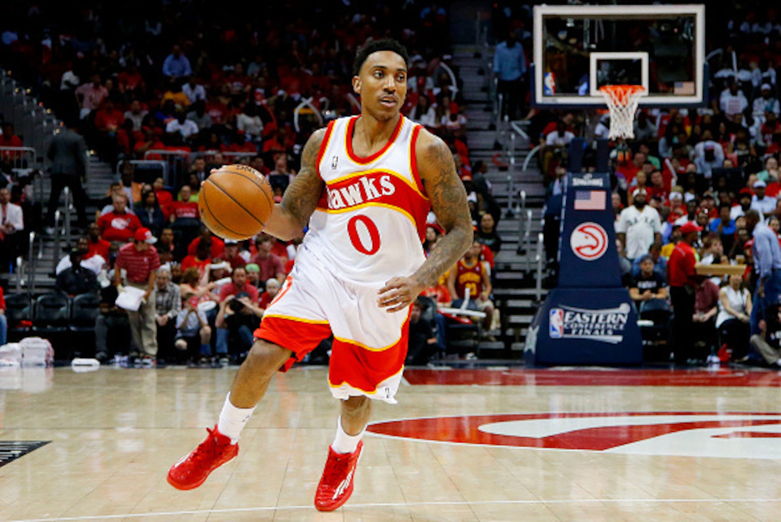ATLANTA, GA - MAY 22:  Jeff Teague #0 of the Atlanta Hawks drives against the Cleveland Cavaliers in the third quarter during Game Two of the Eastern Conference Finals of the 2015 NBA Playoffs at Philips Arena on May 22, 2015 in Atlanta, Georgia. NOTE TO 