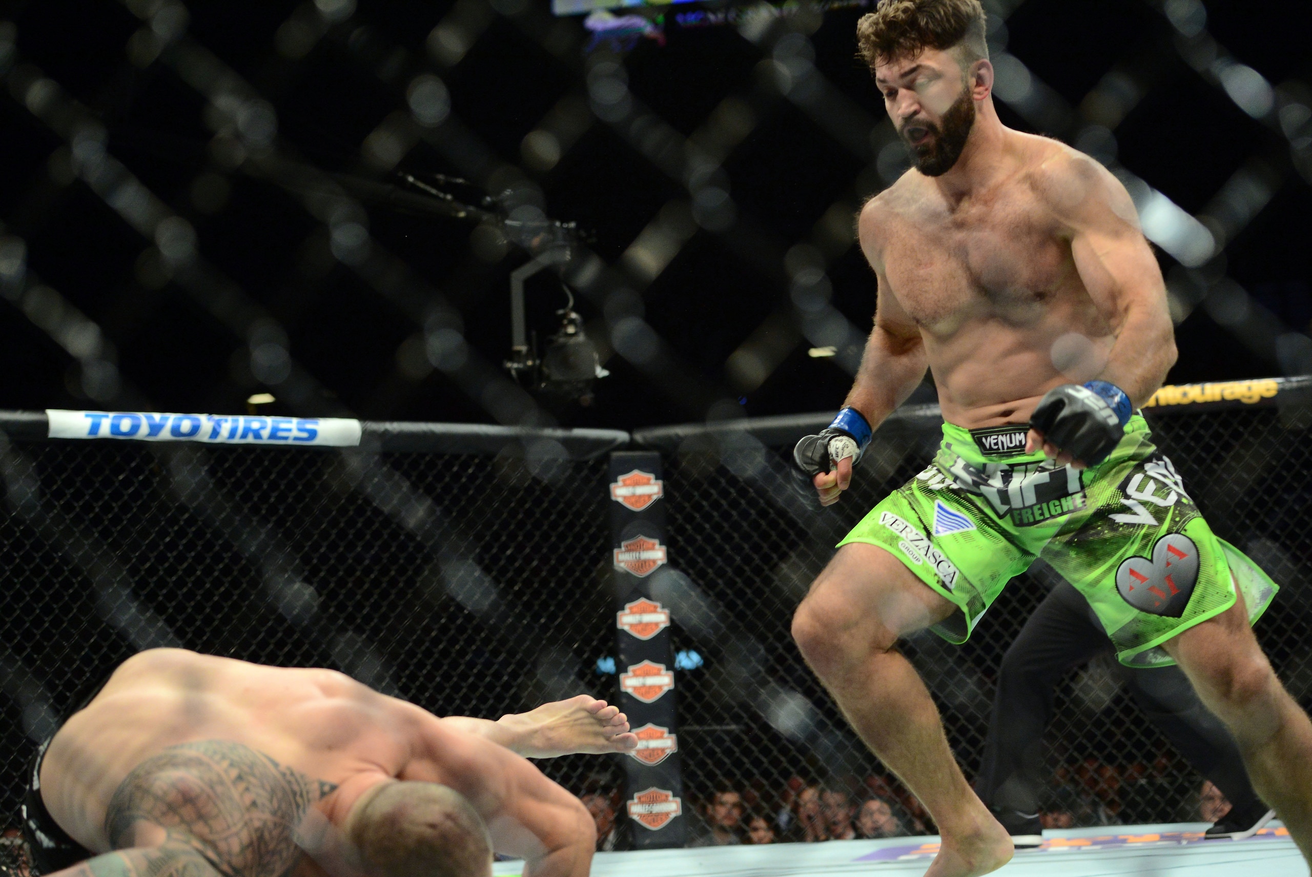 May 23, 2015; Las Vegas, NV, USA; Travis Browne (red gloves) and Andei Arlovski (blue gloves) fight during their heavyweight bout during UFC 187 at MGM Grand Garden Arena. Arlovski won via first round TKO. Mandatory Credit: Joe Camporeale-USA TODAY Sports