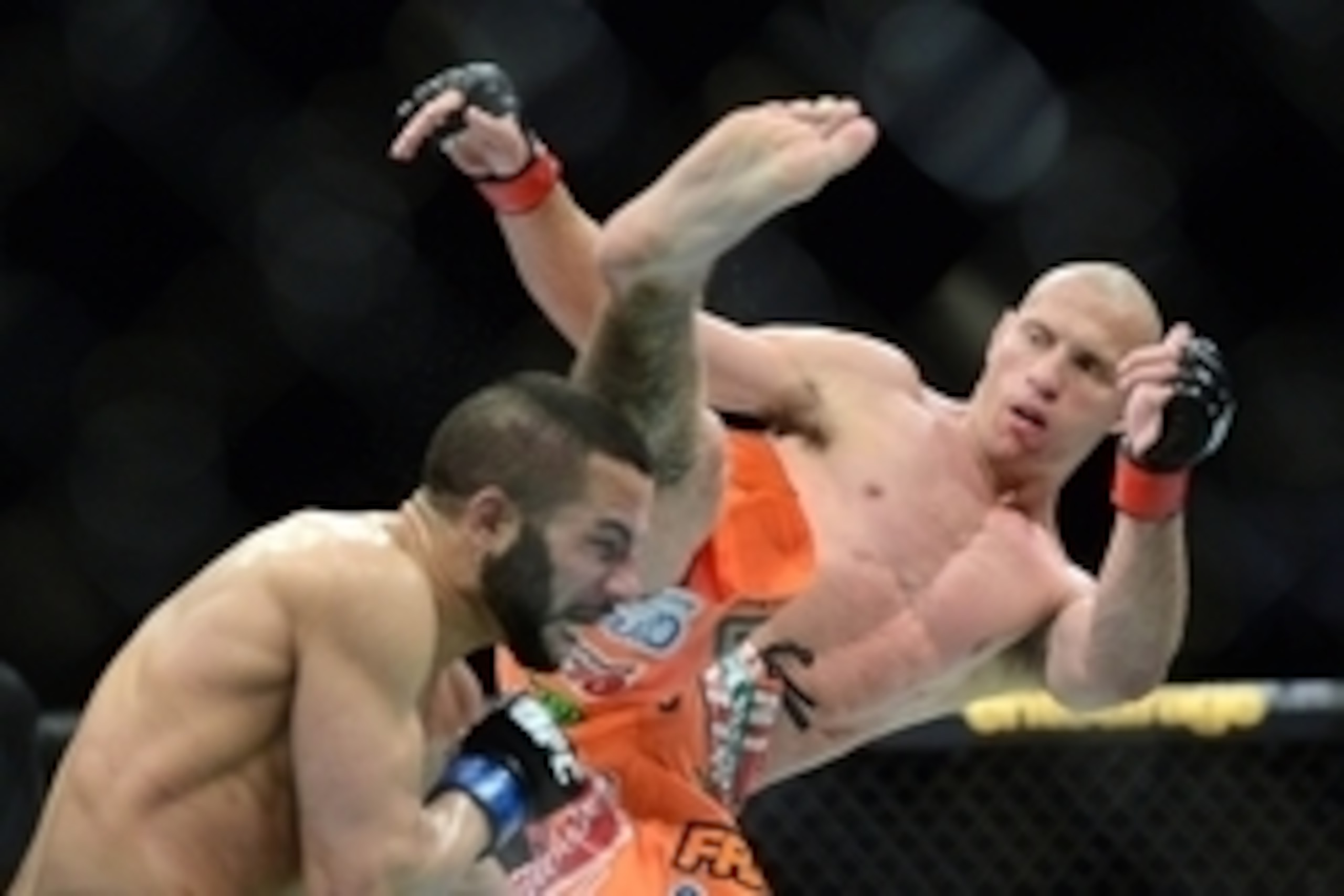 May 23, 2015; Las Vegas, NV, USA; Donald Cerrone (red gloves) and John Makdessi (blue gloves) fight during their lightweight bout during UFC 187 at MGM Grand Garden Arena.  Cerrone won via second round TKO. Mandatory Credit: Joe Camporeale-USA TODAY Sport