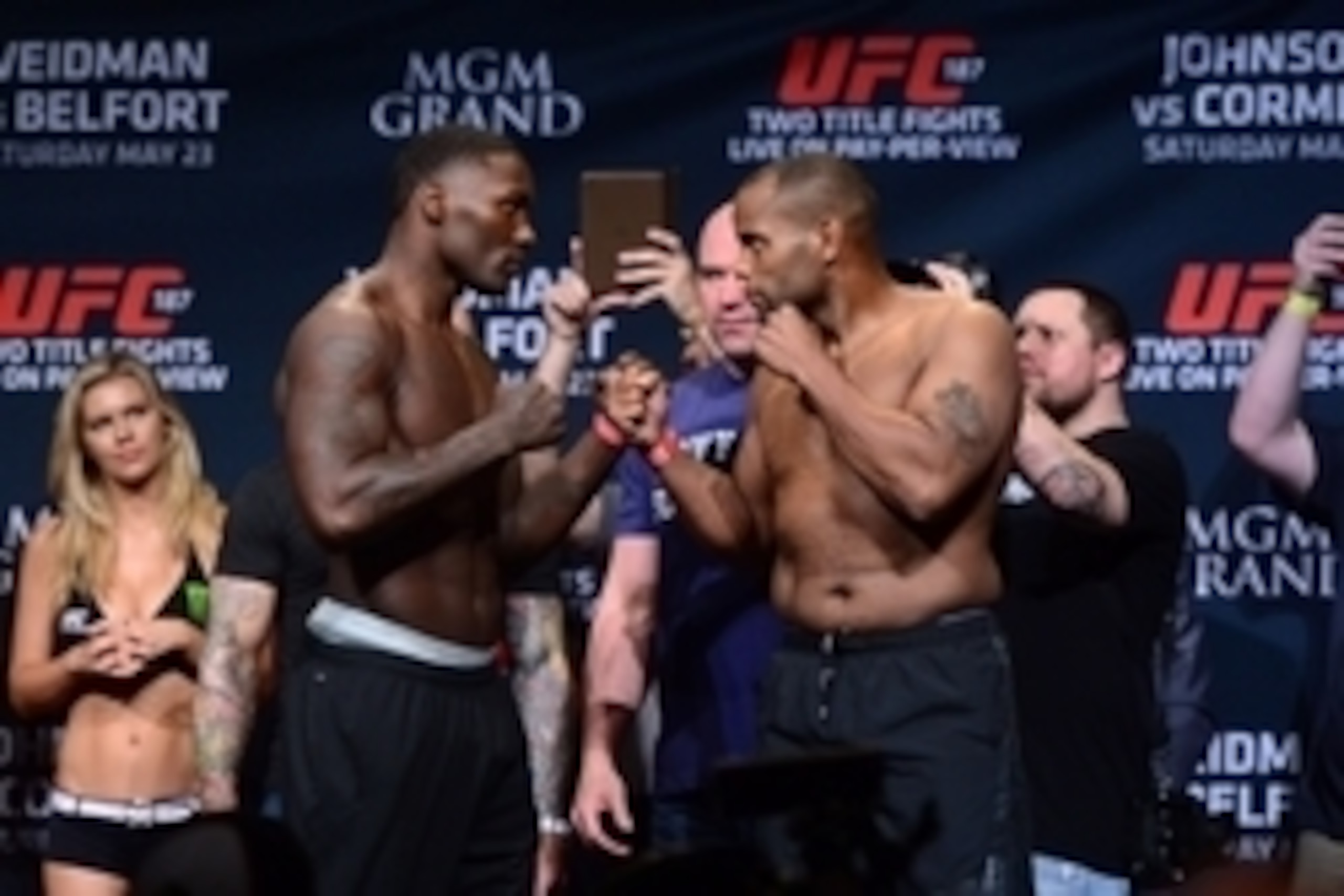 May 22, 2015; Las Vegas, NV, USA; Anthony Johnson (L) and Daniel Cormier (R) face off after weighing in for their light heavyweight bout at MGM GrandBallroom. Mandatory Credit: Joe Camporeale-USA TODAY Sports
