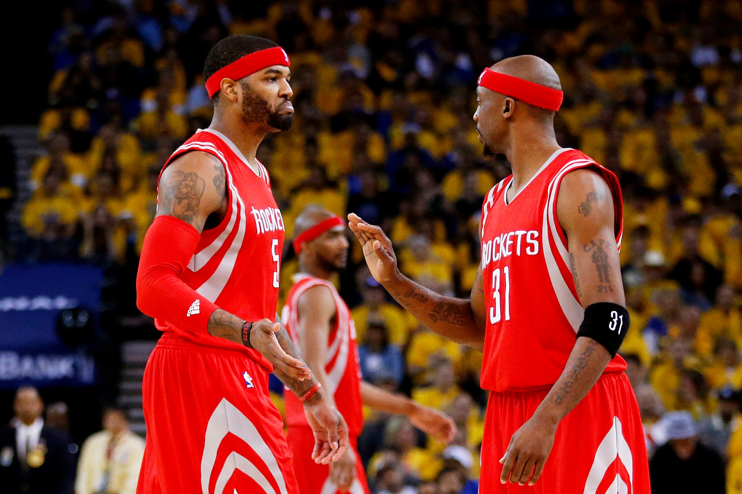 OAKLAND, CA - MAY 19:  Josh Smith #5 and Jason Terry #31 of the Houston Rockets celebrate against the Golden State Warriors in the second quarter during Game One of the Western Conference Finals of the 2015 NBA Playoffs at ORACLE Arena on May 19, 2015 in
