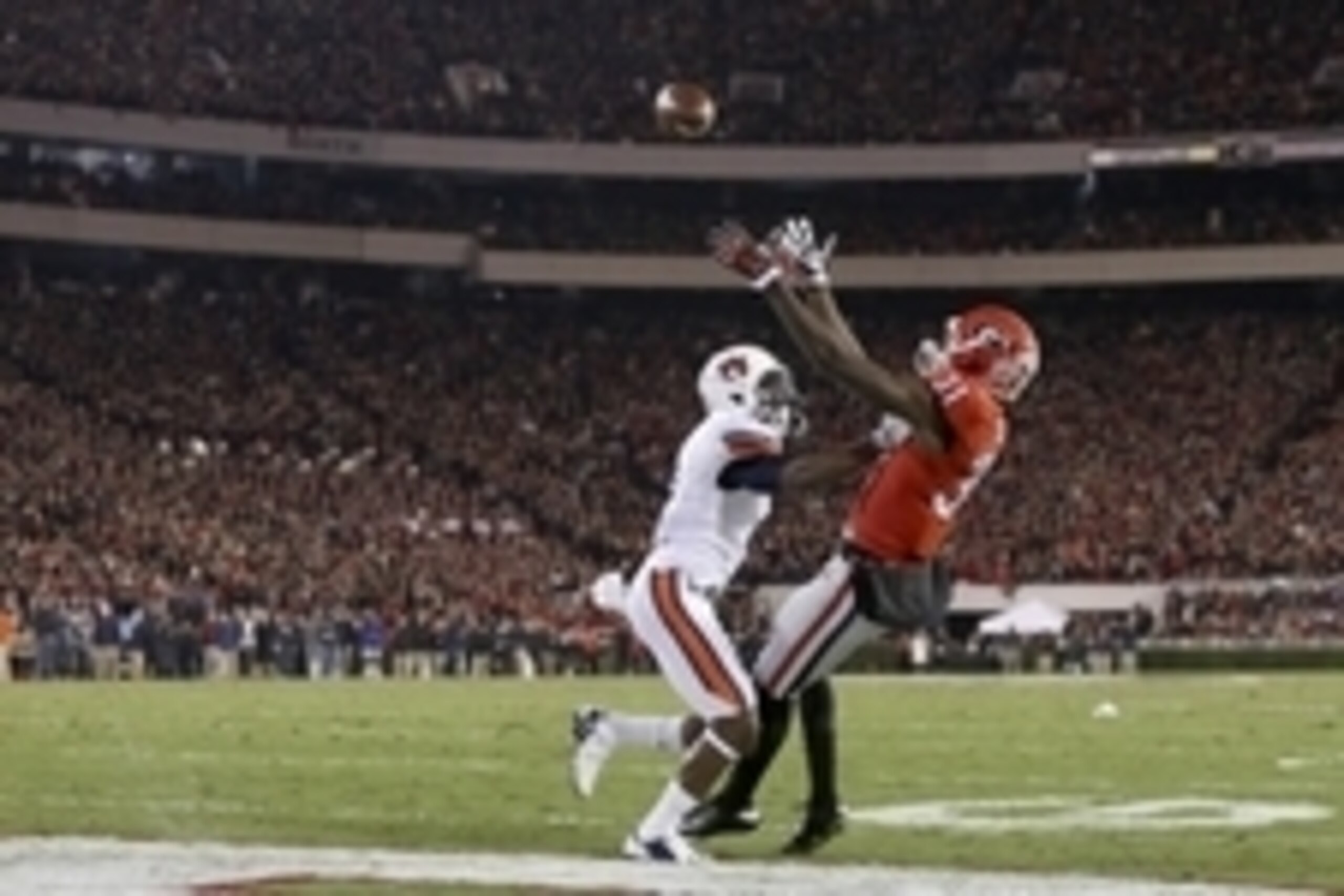 Nov 15, 2014; Athens, GA, USA; Georgia Bulldogs wide receiver Chris Conley (31) can't make a touchdown catch against Auburn Tigers defensive back Jonathan Jones (3) in the first quarter of their game at Sanford Stadium. Mandatory Credit: Jason Getz-USA TO