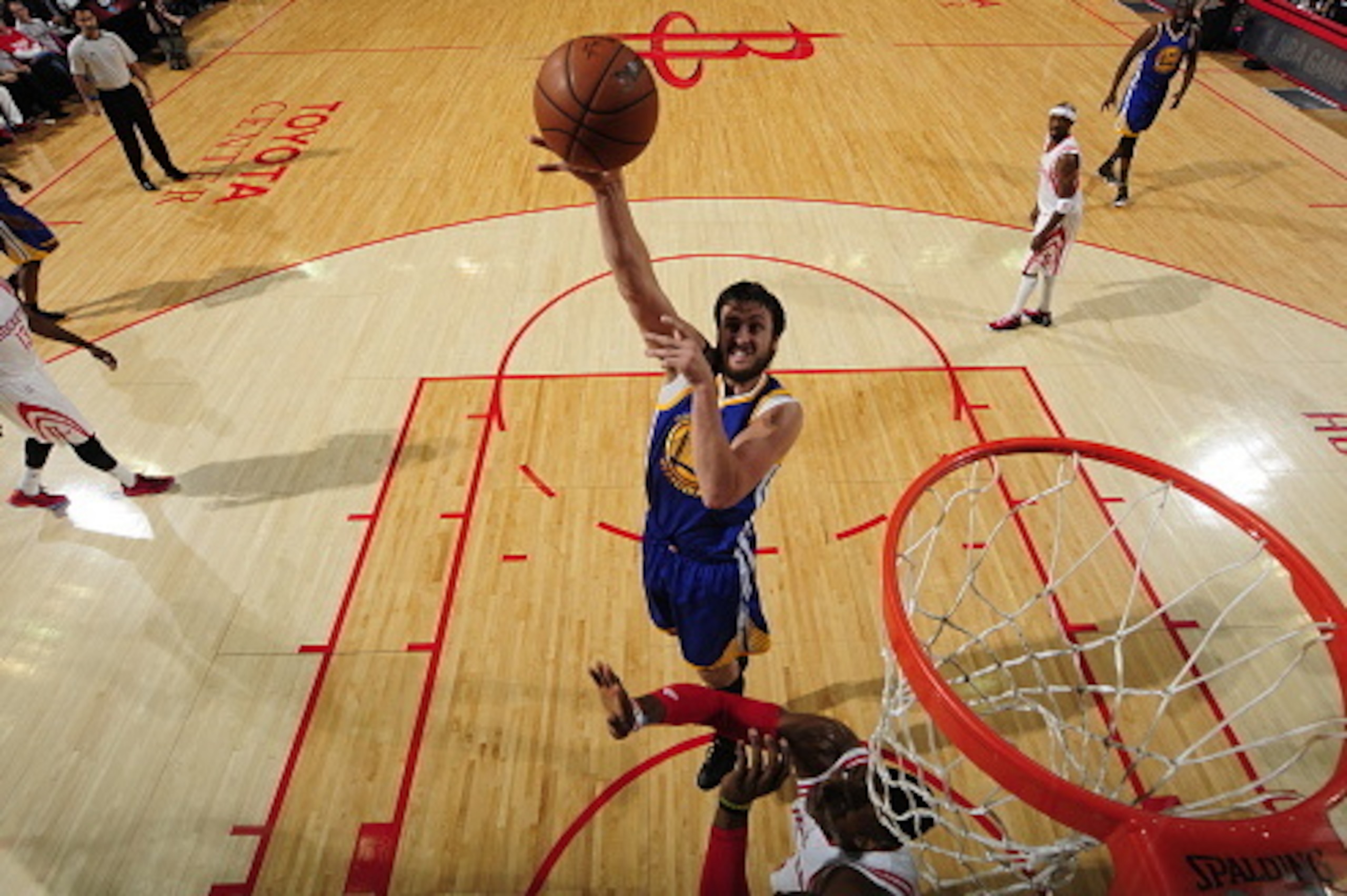 HOUSTON, TX - MAY 23:  Andrew Bogut #12 of the Golden State Warriors shoots against the Houston Rockets in Game Three of the Western Conference Finals during the 2015 NBA Playoffs on May 23, 2015 at the Toyota Center in Houston, Texas. NOTE TO USER: User 