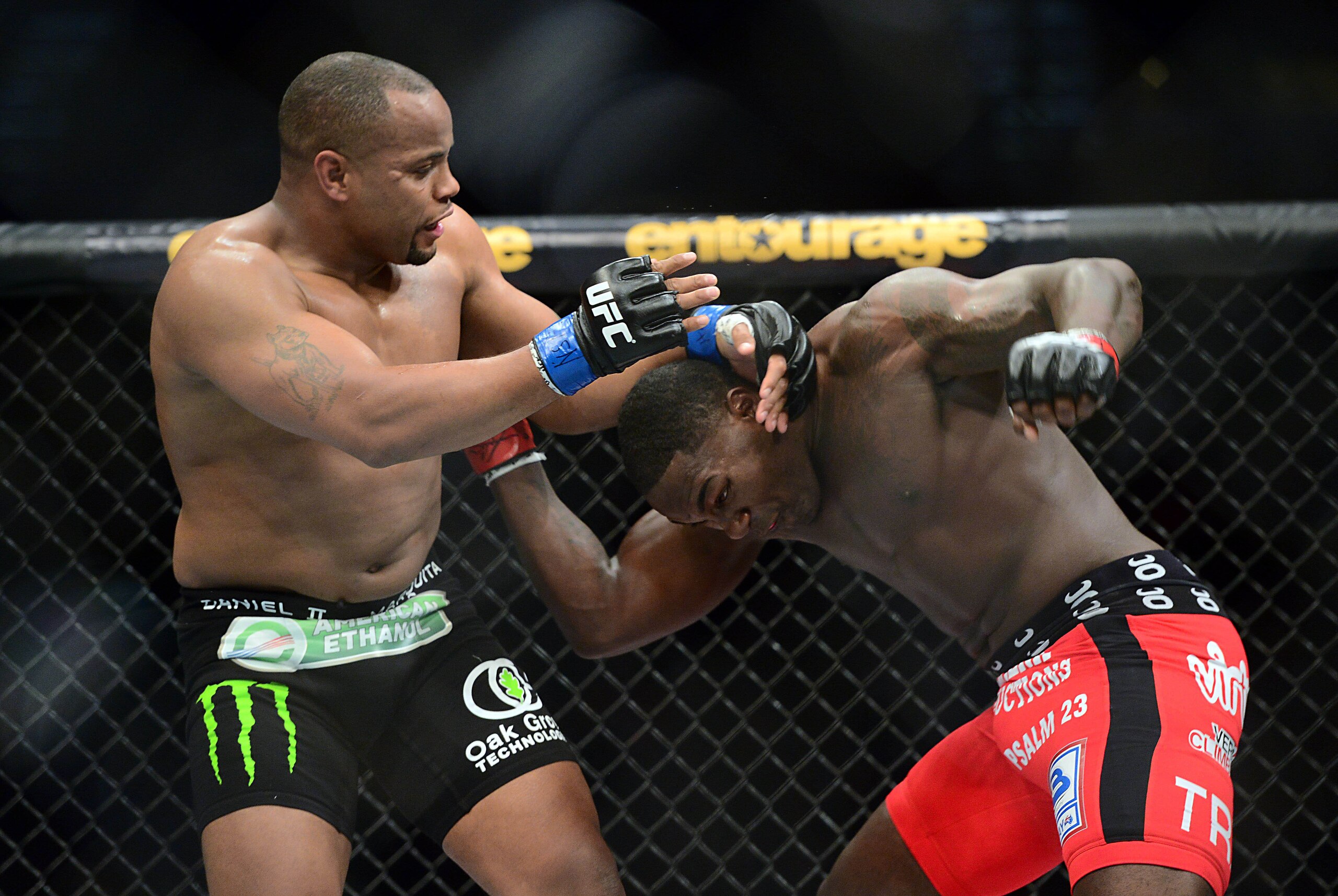 May 23, 2015; Las Vegas, NV, USA; Anthony Johnson (red gloves) and Daniel Cormier (blue gloves) fight during their light heavyweight championship bout during UFC 187 at MGM Grand Garden Arena. Cormier won via third round TKO. Mandatory Credit: Joe Campore