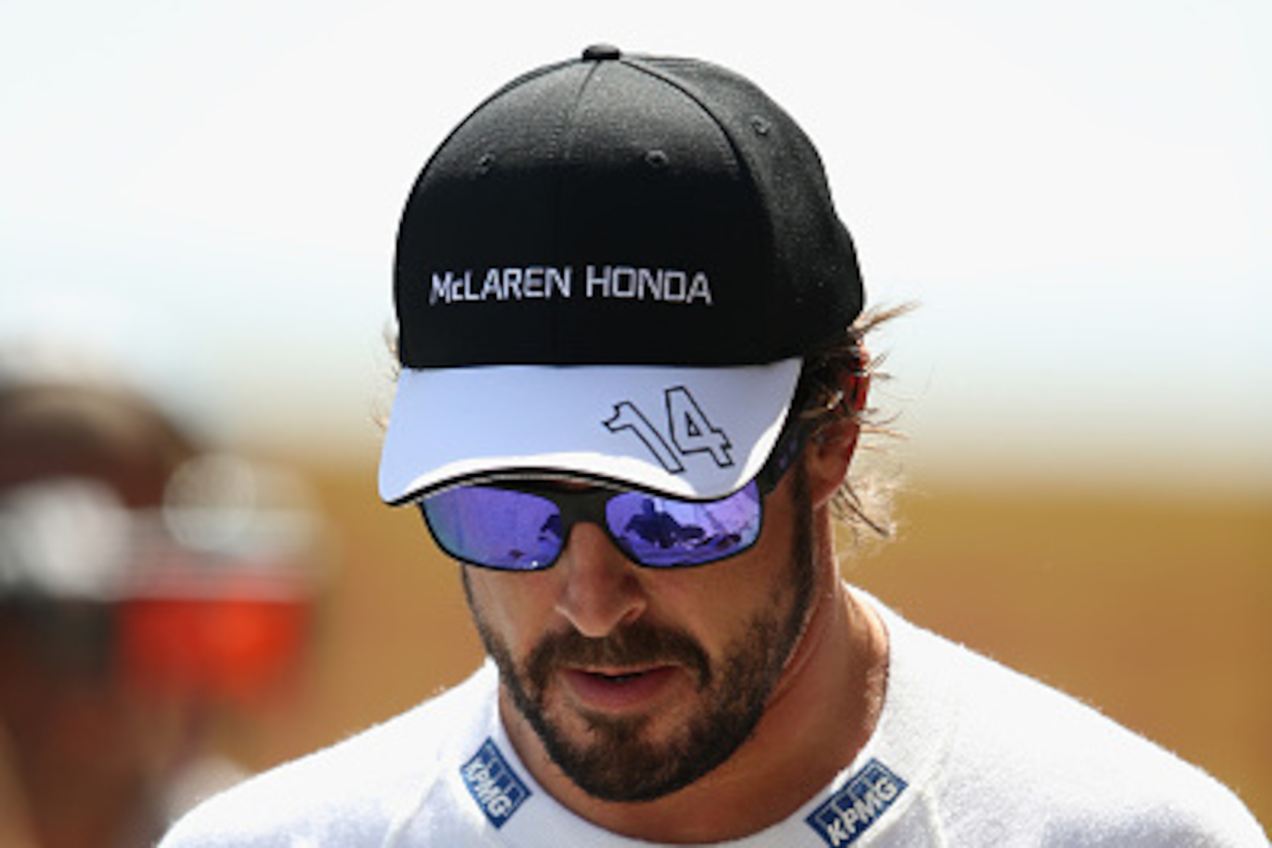 MONTMELO, SPAIN - MAY 09:  Fernando Alonso of Spain and McLaren Honda walks along the pit lane during qualifying for the Spanish Formula One Grand Prix at Circuit de Catalunya on May 9, 2015 in Montmelo, Spain.  (Photo by Mark Thompson/Getty Images)